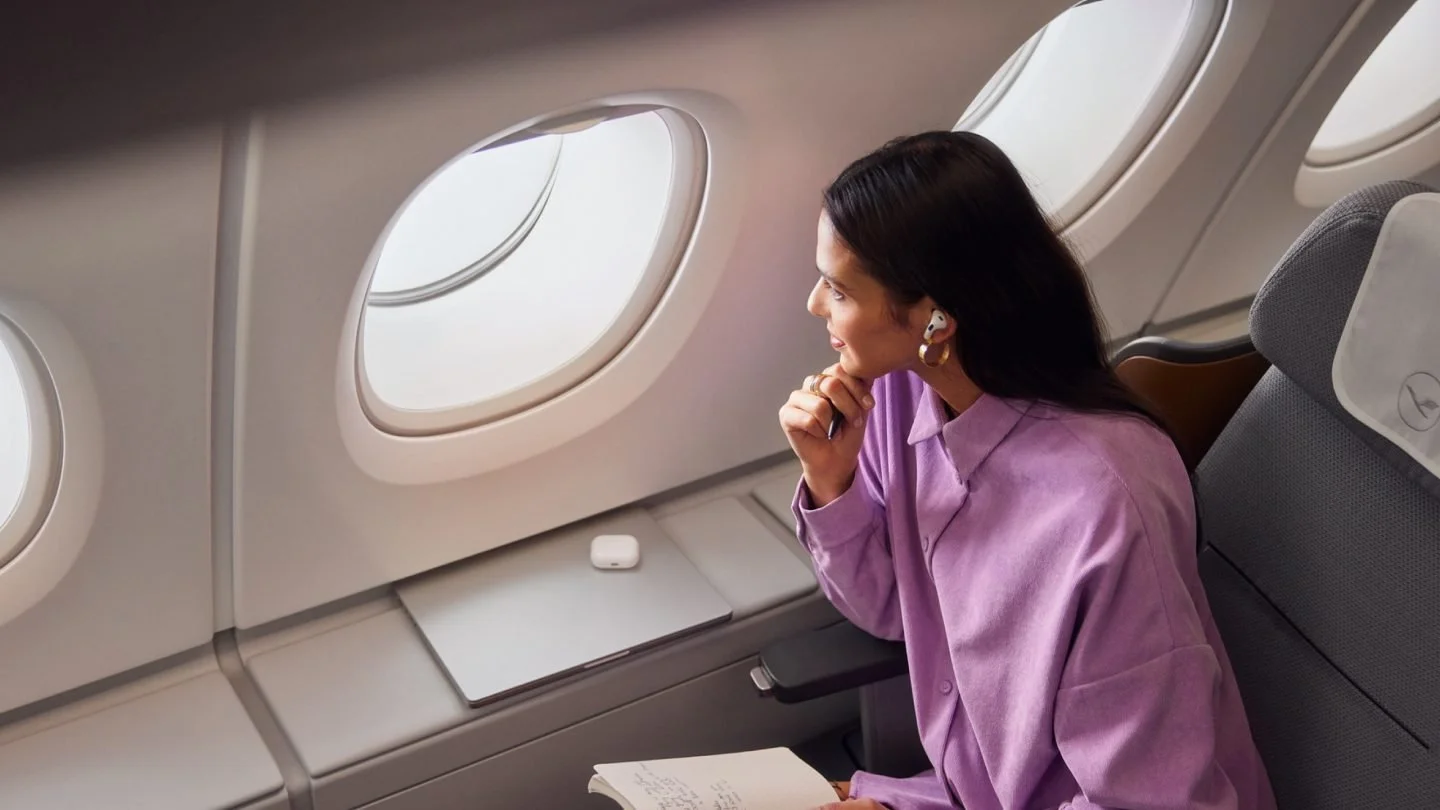 Traveller enjoying a flight booked with Aeroplan points from Vancouver YVR"