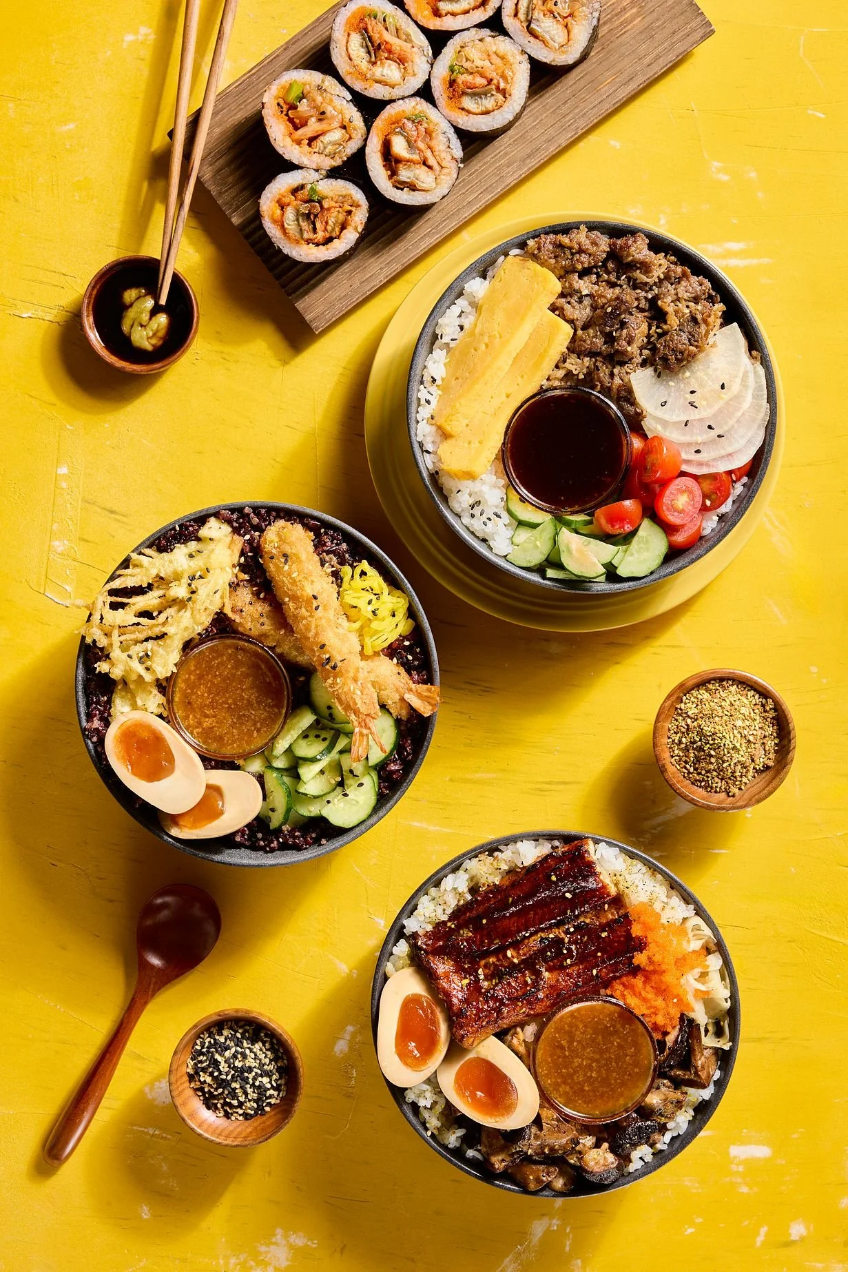 Maki rolls and poke bowls photographed for a branding campaign for Wooshi by SaladStop in Singapore