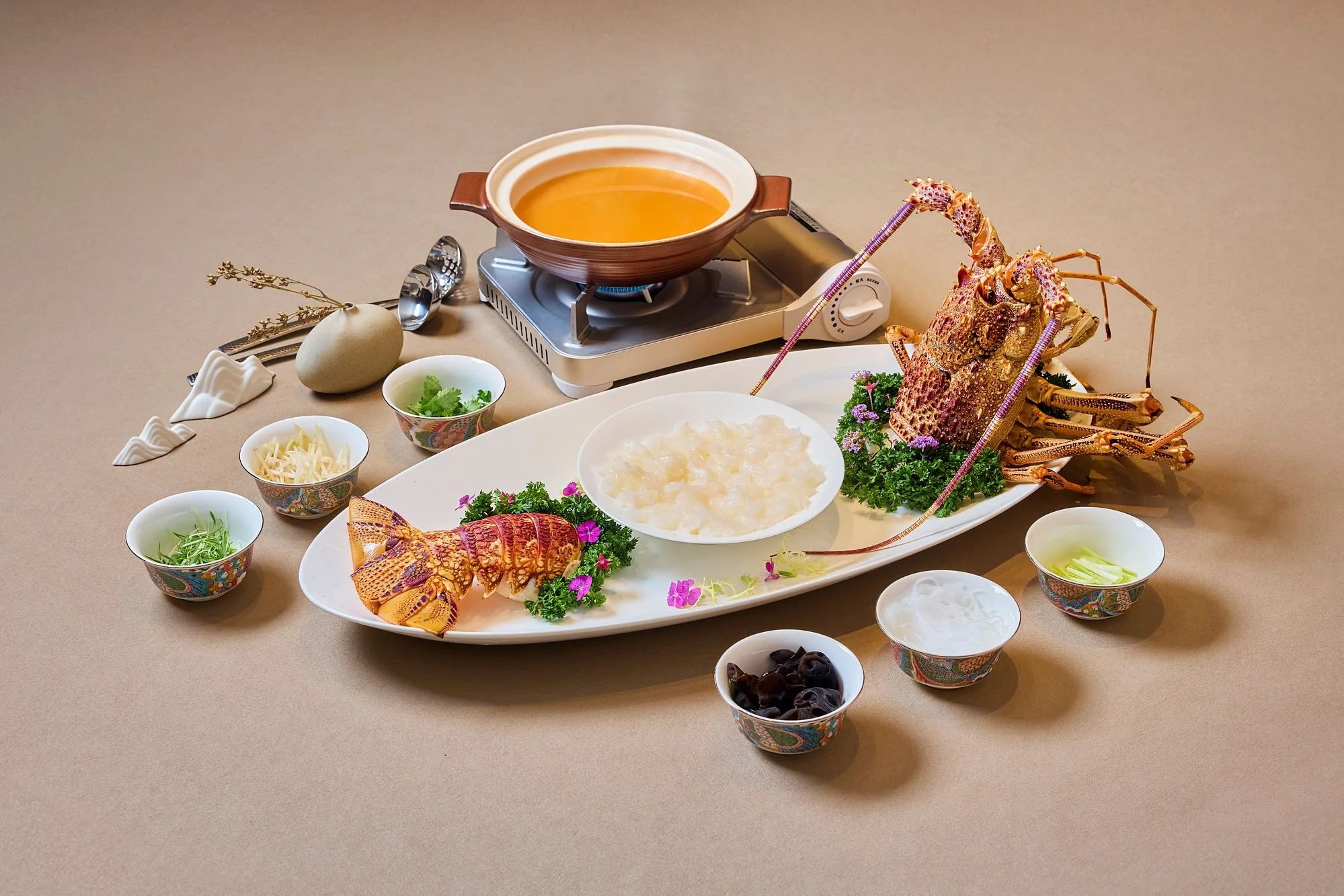 Fresh lobster hotpot photographed for a new menu launch for Pure Gem Chinese Cuisine in Singapore