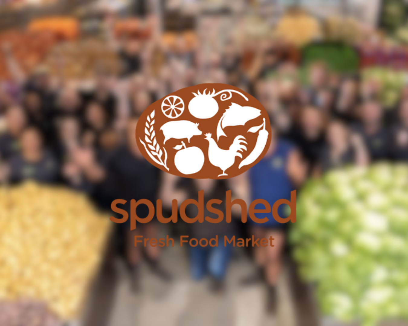 Logo for Spudshed Fresh Food Market over a blurred background of a group of people at a market with produce and flowers.