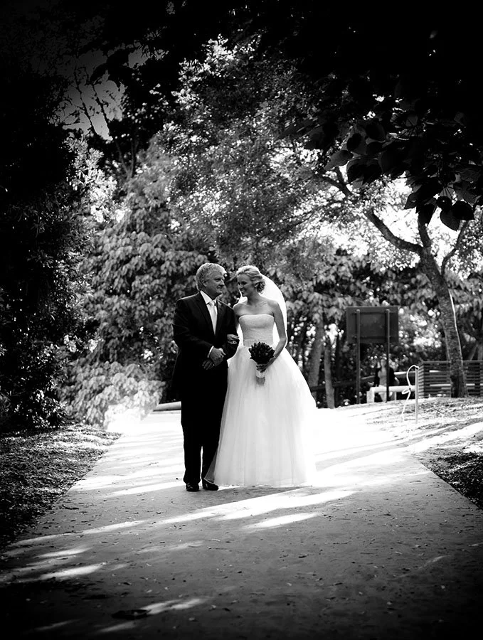 A bride Walking with her father down the isle at Noosa, Sunshine coast 