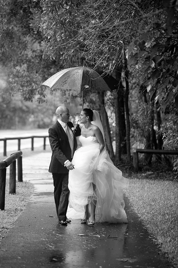Bride and groom rainy day at Noosa, Wedding photography. 