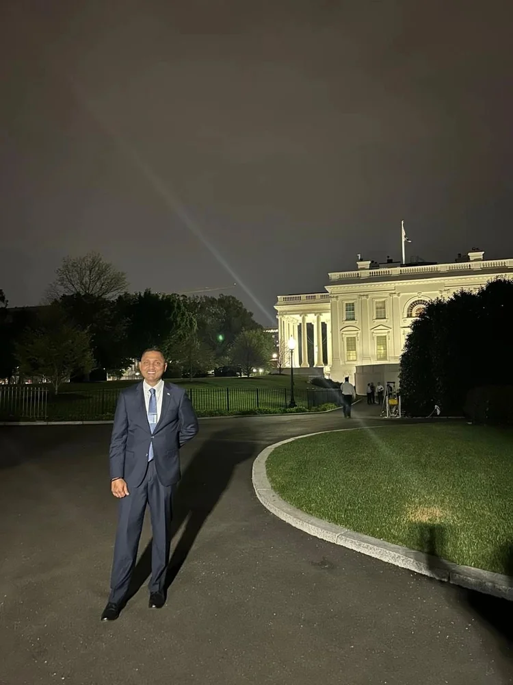 Dr. Meahjohn outside White House at night