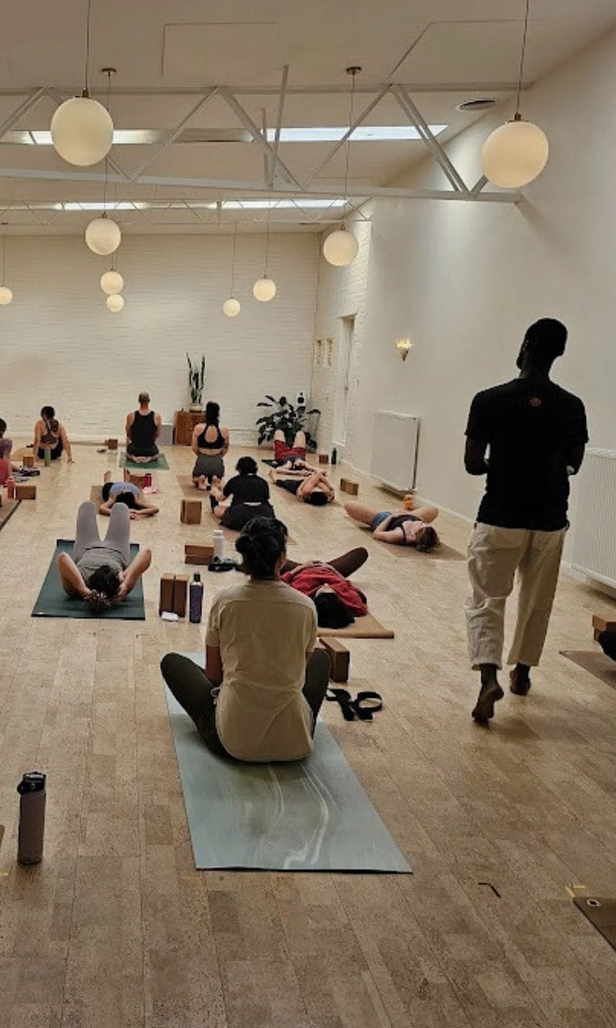 Yoga class in progress at I Am That Studio in Collingwood, Melbourne