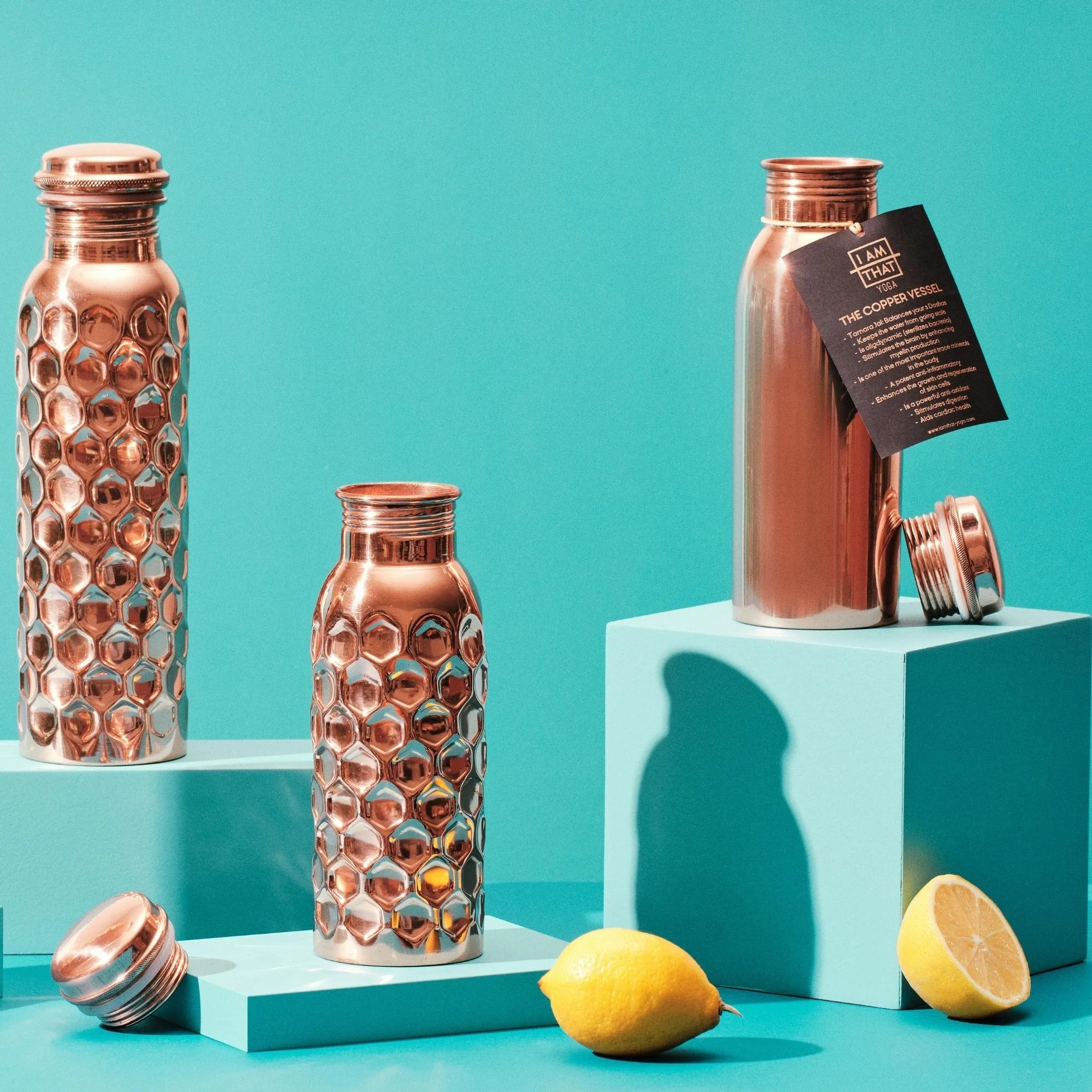 Handmade smooth and hammered copper water bottles from I Am That Studio.