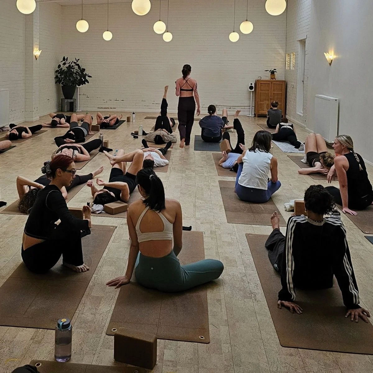 Corporate yoga group class at I Am That Studio in Collingwood