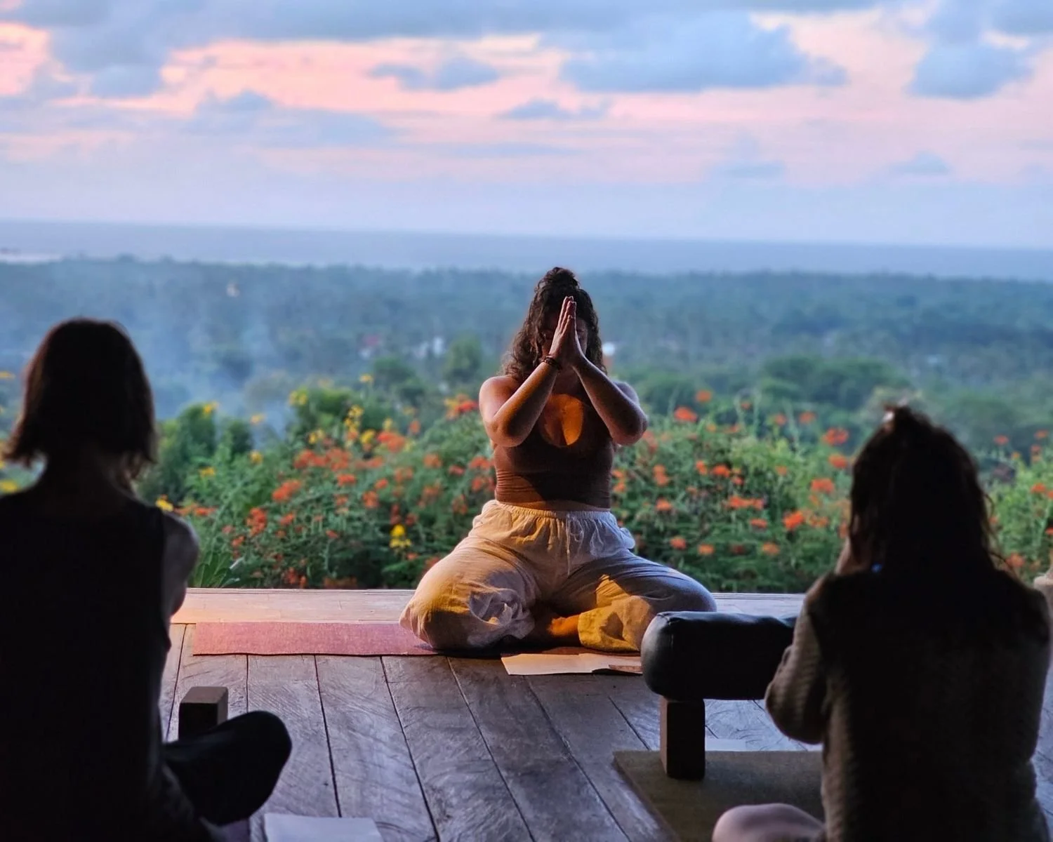 Sunset yoga and meditation practice at the I Am That Studio Bali retreat in Northwest Bali