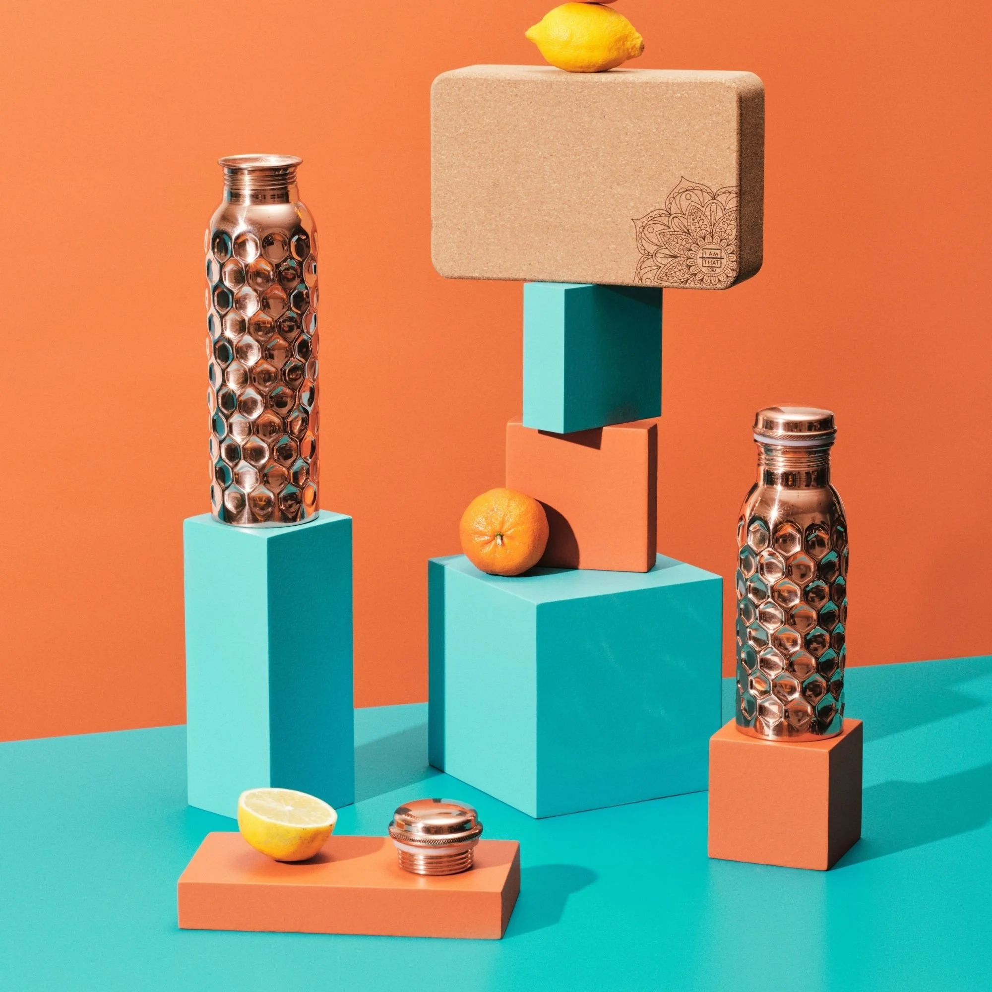 Cork yoga block and hammered copper water bottles at I Am That Studio.