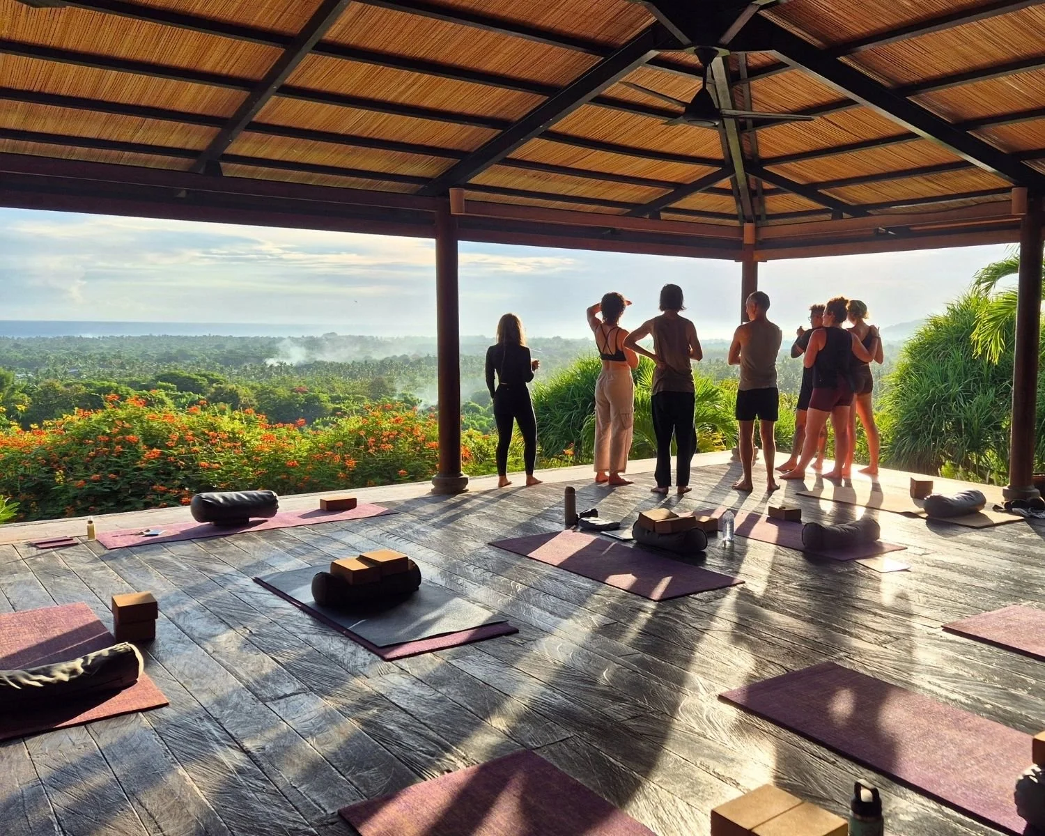 Morning yoga practice in an open-air shala at the I Am That Studio Bali retreat in Northwest Bali