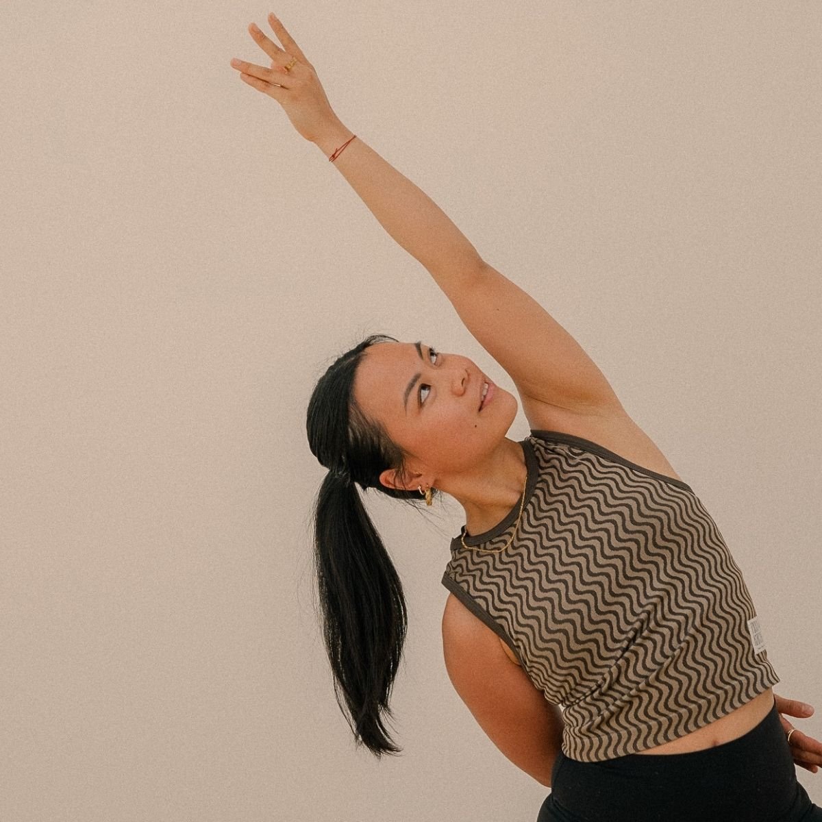 Student practising Reverse Warrior II in a YinYasa Yoga class at I Am That Studio in Collingwood, Melbourne.