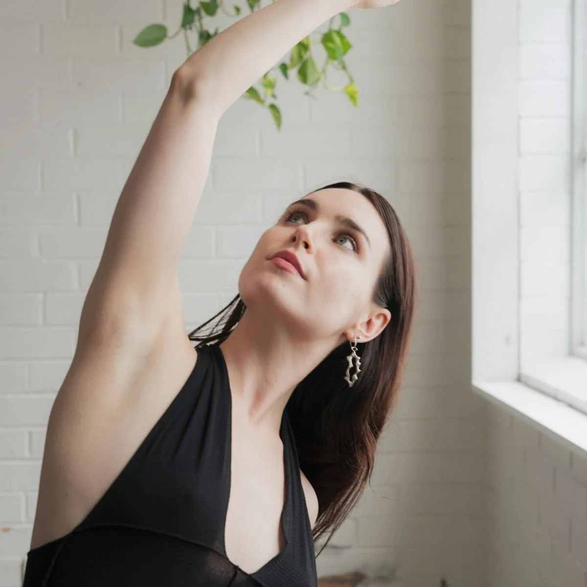 Indigo Keane, Reformer Pilates and Mat Pilates teacher at I Am That Studio in Collingwood, Melbourne