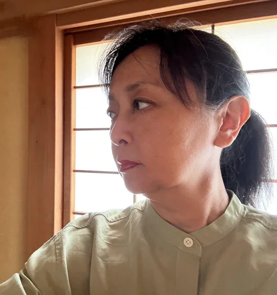 Portrait of fiber artist Atsuko Chirikjian, instructor of Japanese boro pouch and sashiko stitching workshop