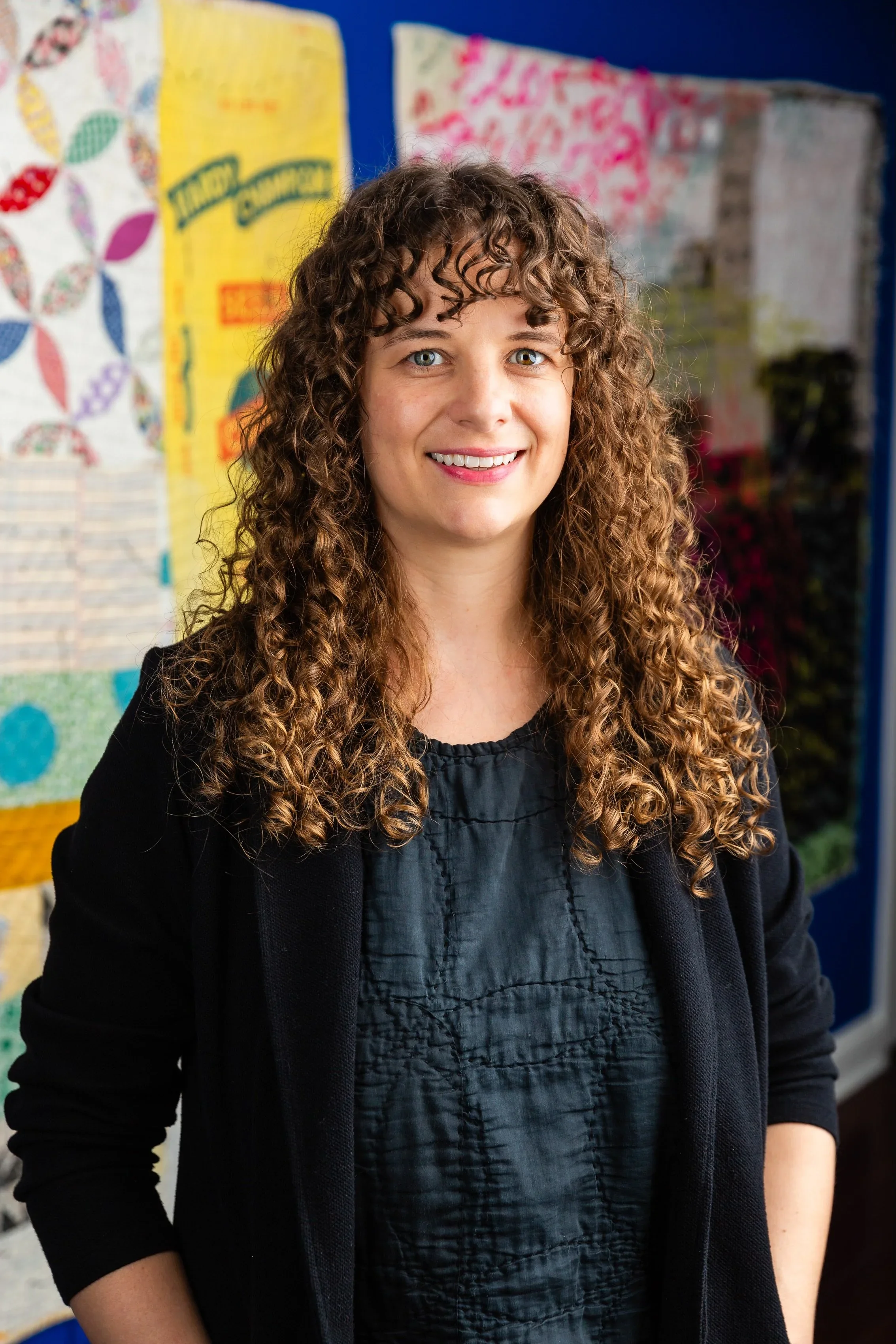 Quilt artist Heidi Parkes in studio, known for expressive hand appliqué and stitched compositions