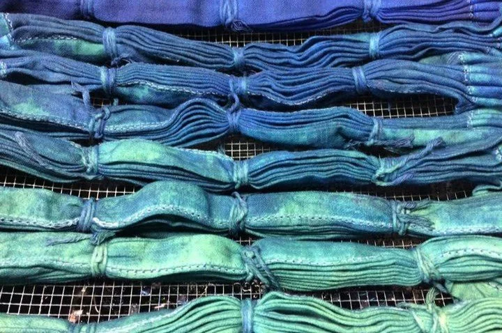 freshly dyed indigo oxidizing from green to blue