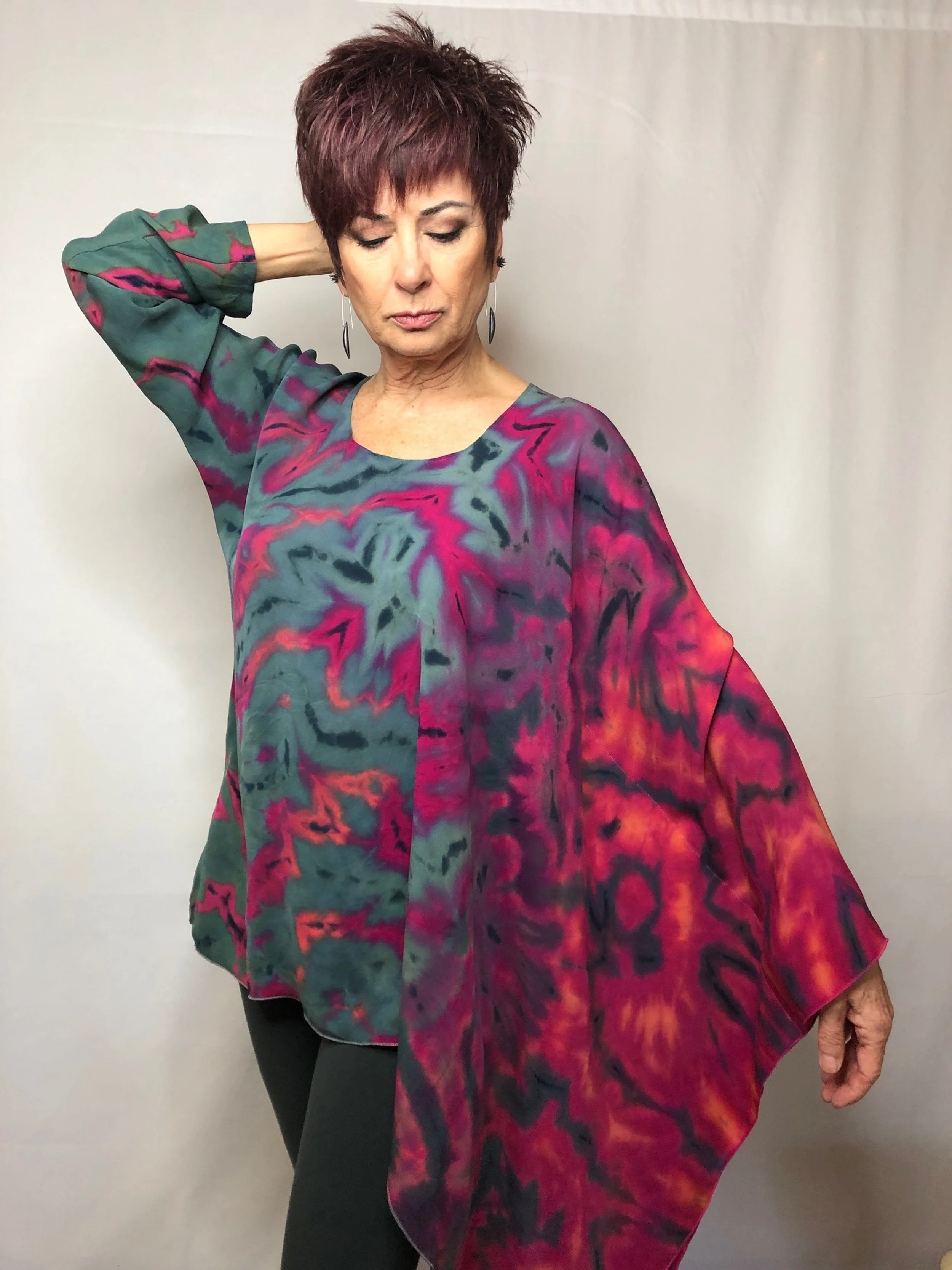 Textile artist Karen Rose modeling shibori dyed yardage transformed into a contemporary garment