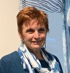 Portrait of textile artist Suzanne Connors, founder of Aya Fiber Studio and Aizome Studio, specializing in Japanese indigo and shibori techniques