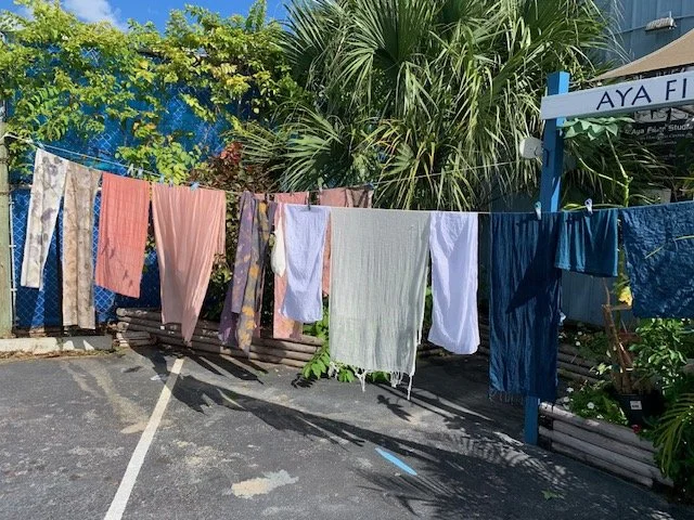 Freshly rinsed textiles drying in the sun