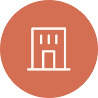 Icon of a tall building with a door at the bottom, set against a circular brown background.