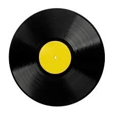 A black vinyl record with a yellow label in the center.