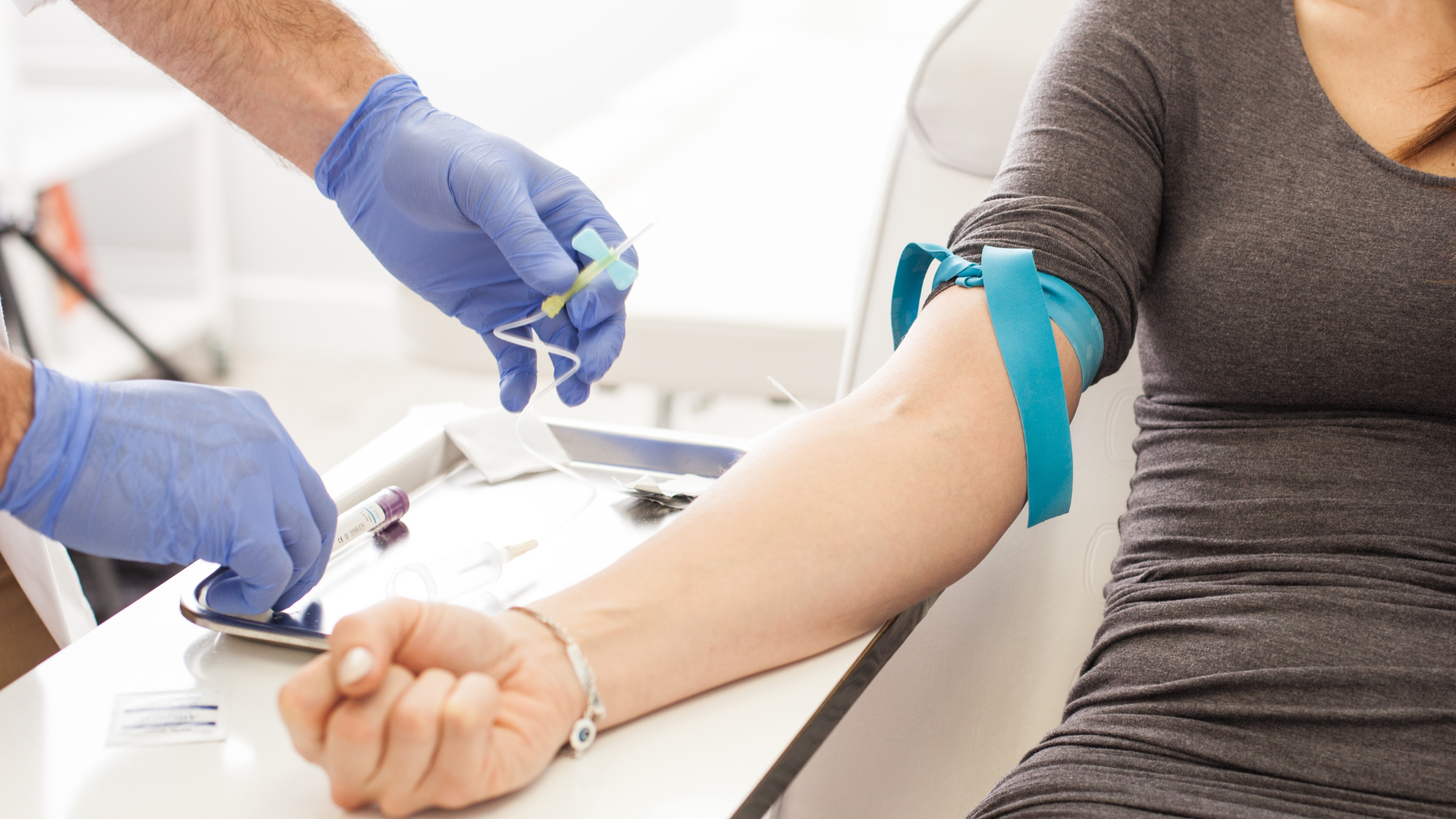Patient giving blood for analysis at SkanWell in Camillus NY