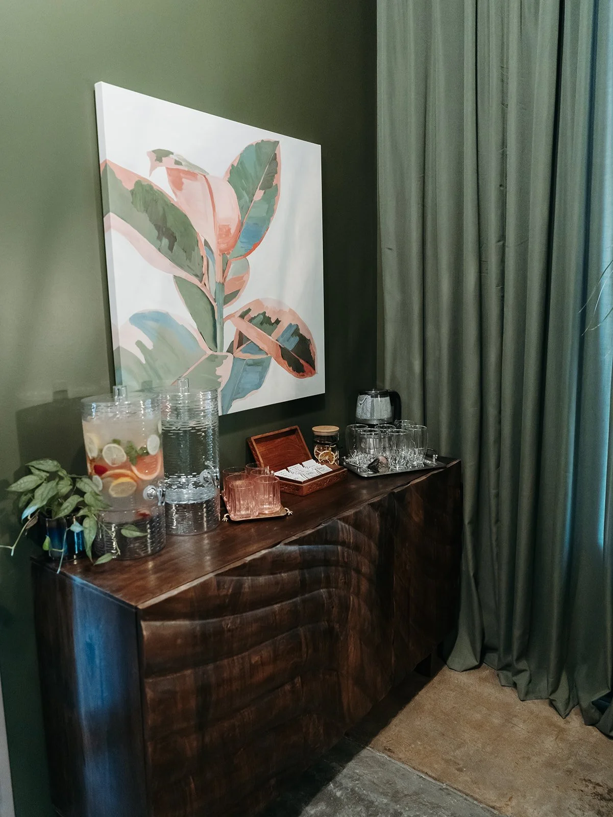 Amenities bar with spa water, hot tea, and mimosas