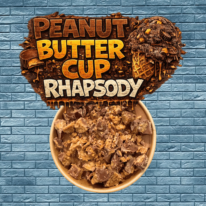 A scoop with the confidence of a man in an armband with the voice to back it up.
Peanut Butter Rhapsody doesn’t just sit in the freezer — it arrives, sweeping in with a velvet‑dark chocolate base that feels like the opening note of a stadium anthem. 