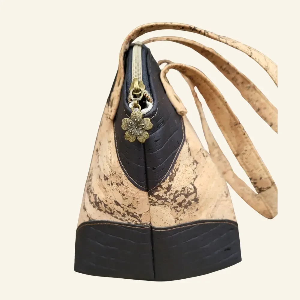 handtas naturel met zwart zijkant.webp