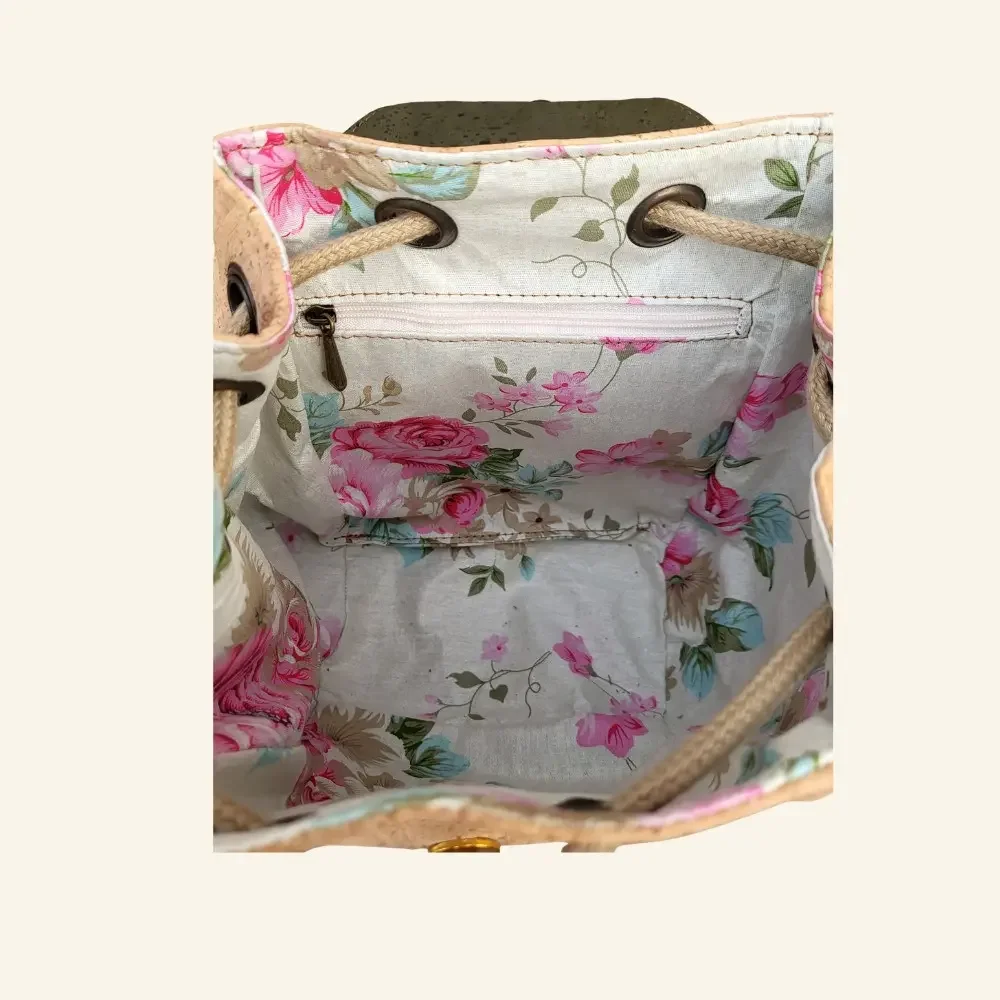 Rugtas naturel met groen bladmotief binnenkant.webp