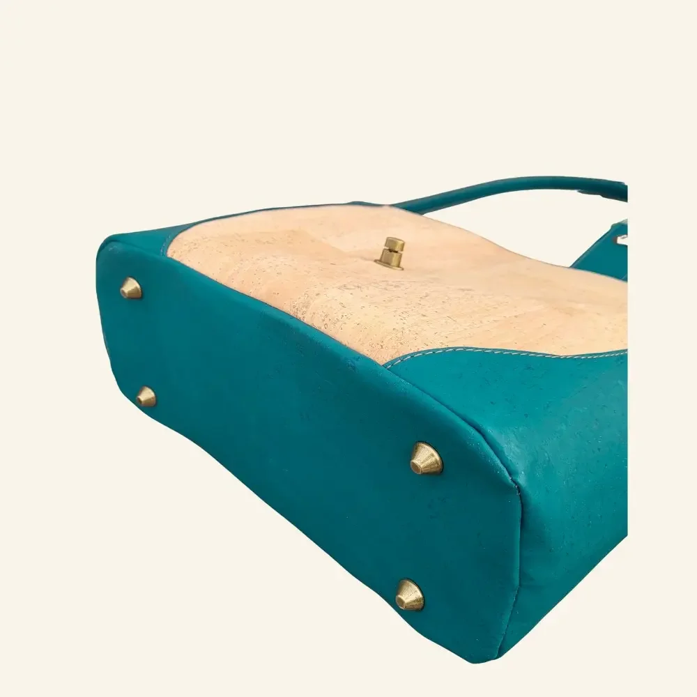 Schoudertas naturel met teal  onderkant.webp