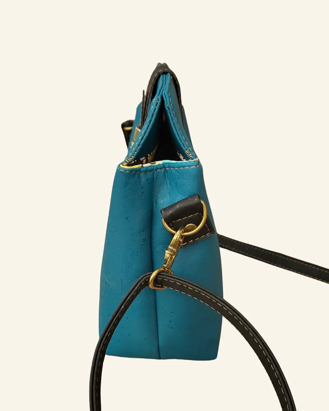 Crossbody tas turquoise  zijkant.webp