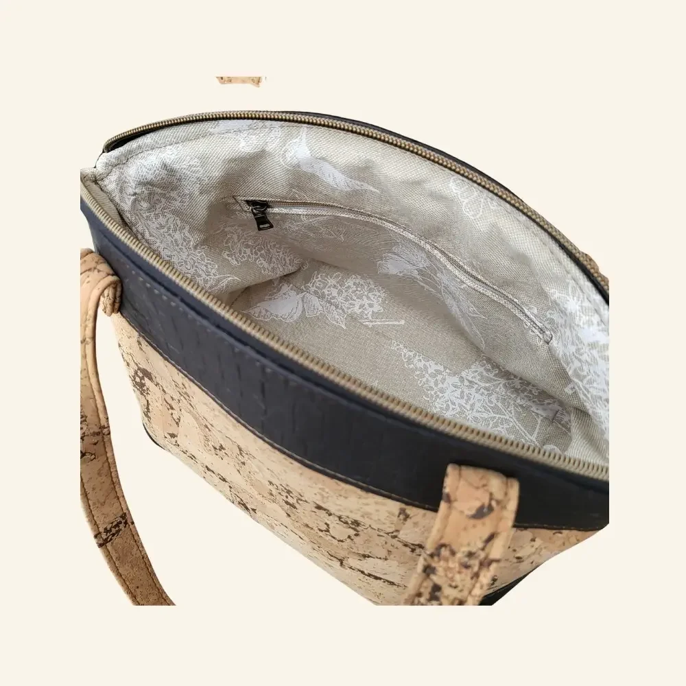 handtas naturel met zwart binnenkant.webp