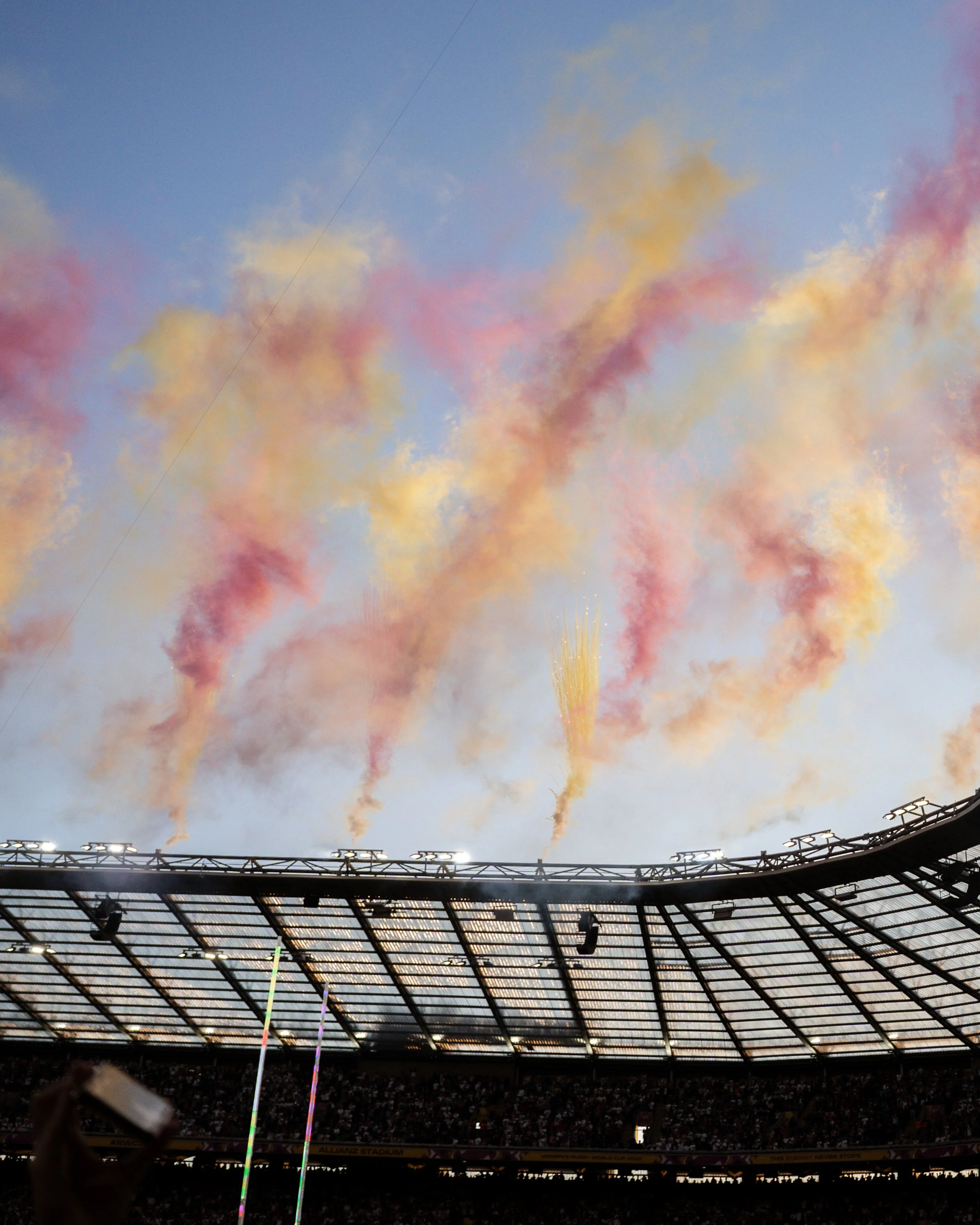 Colorful smoke and fireworks in the sky above Twickenham stadium during the Womens World Cup Rugby Final
