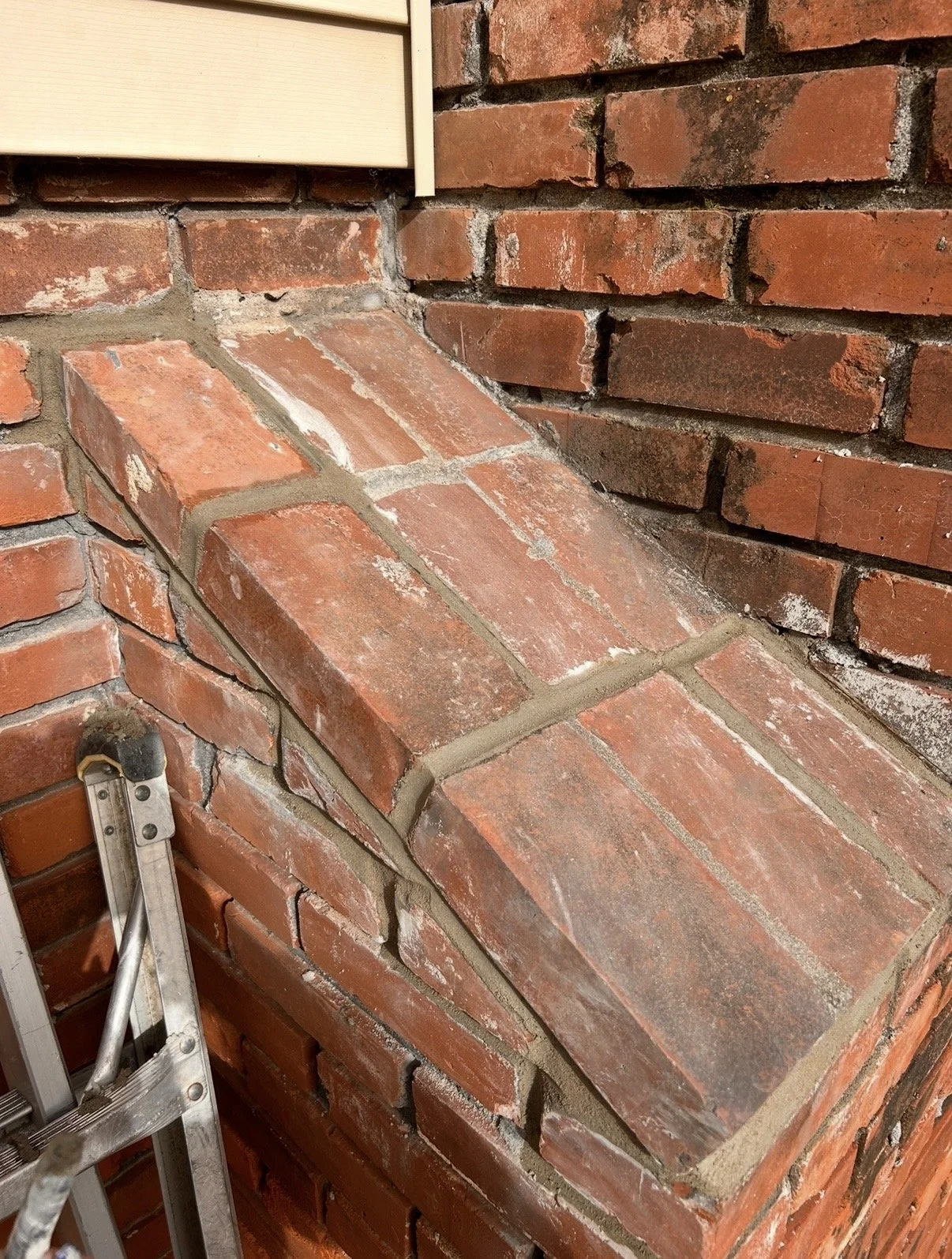 After picture of a brick chimney repair.