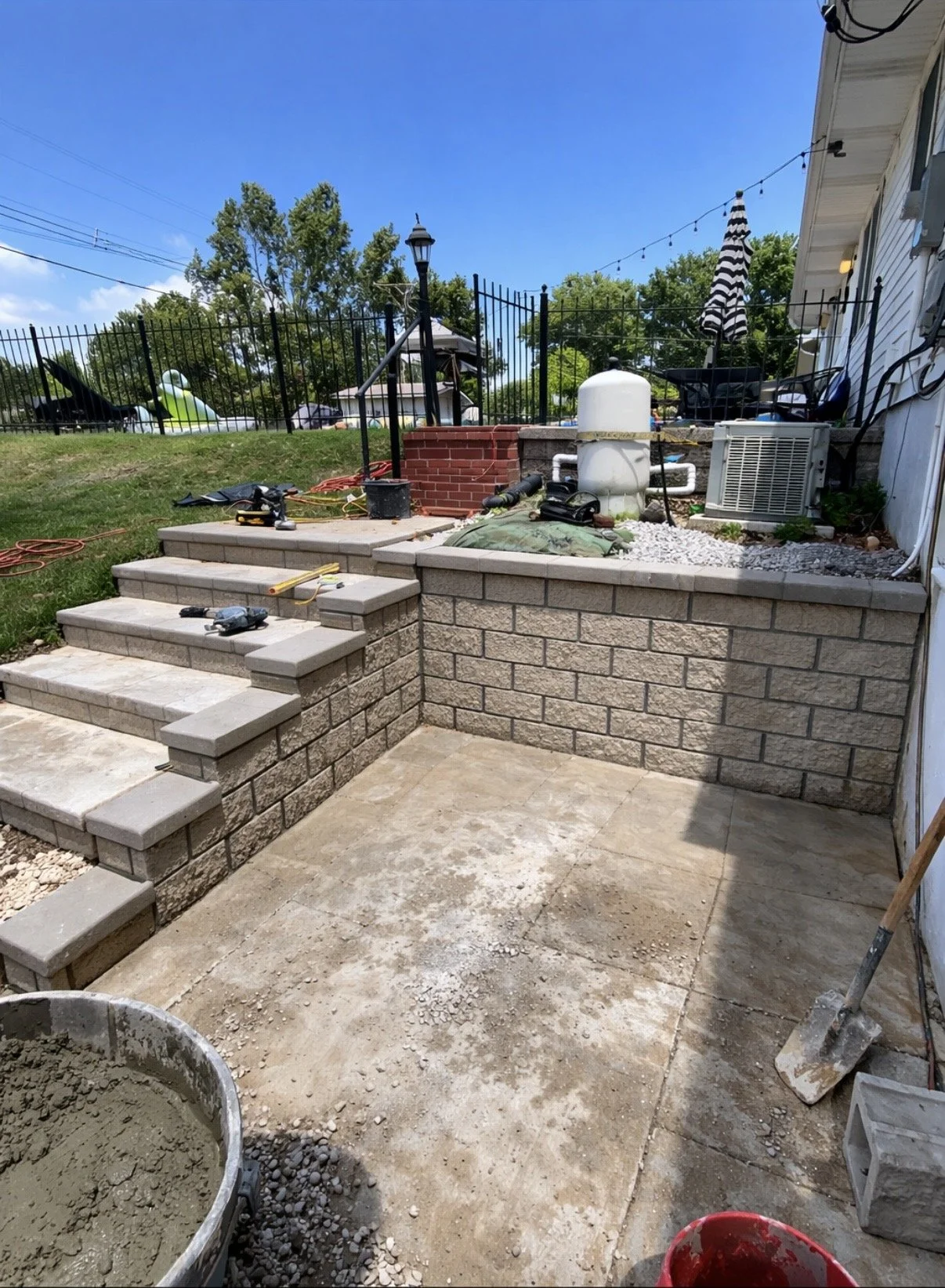 After picture of a new retaining wall with caps