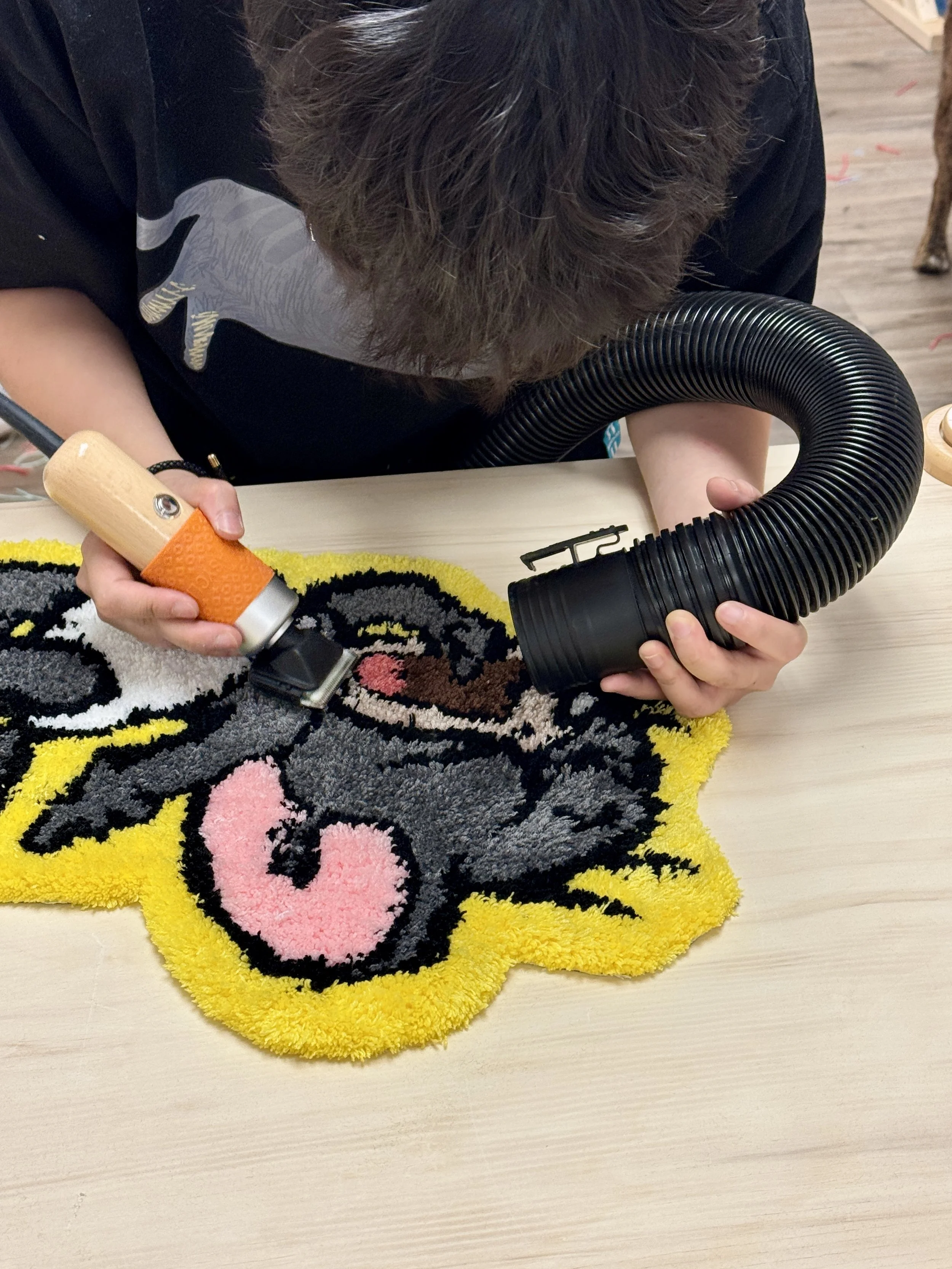 Dotty stuff is  taking care of rug finishing: shaving.