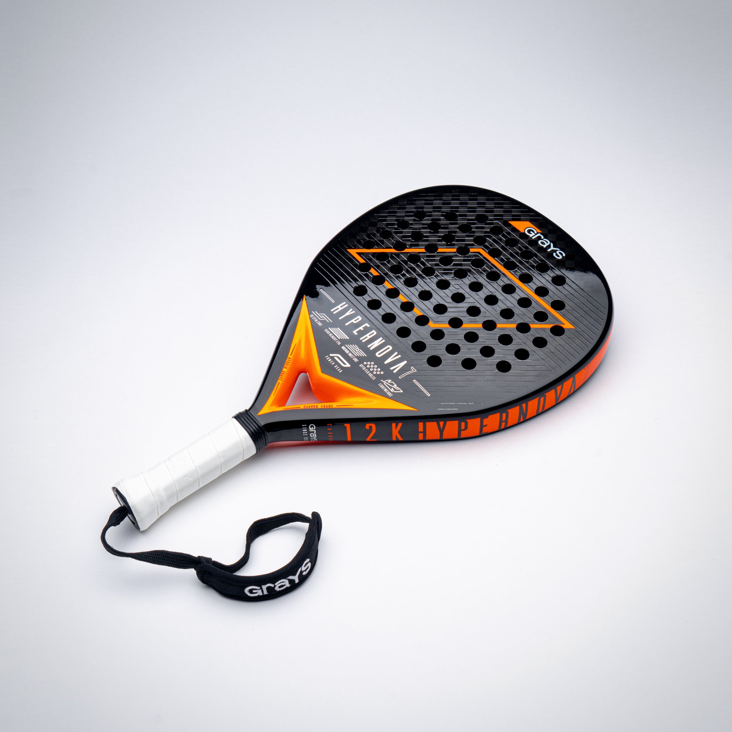 grays padel racket black and orange
