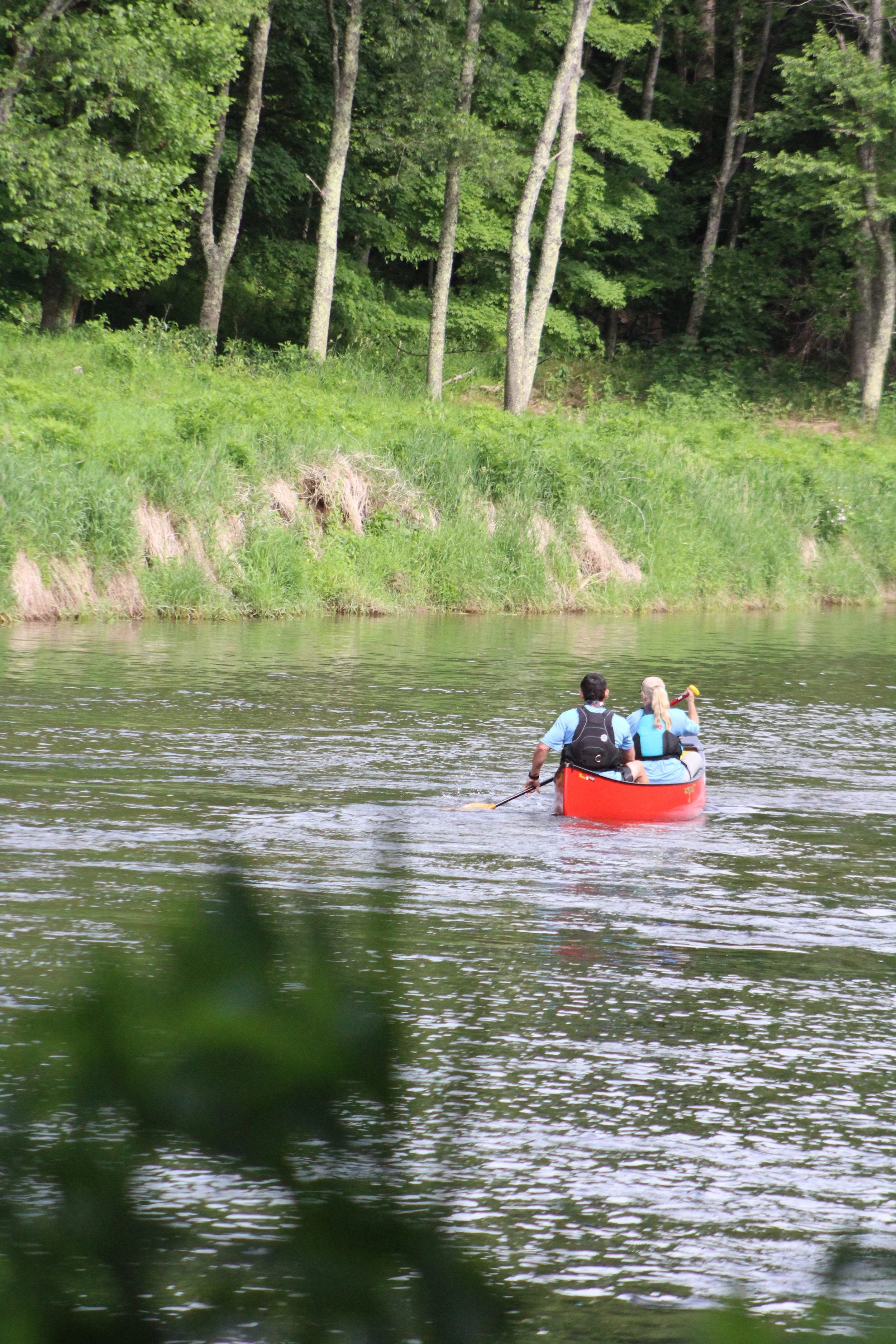 Two people kayaking on the new river in Ashe County North Carolina