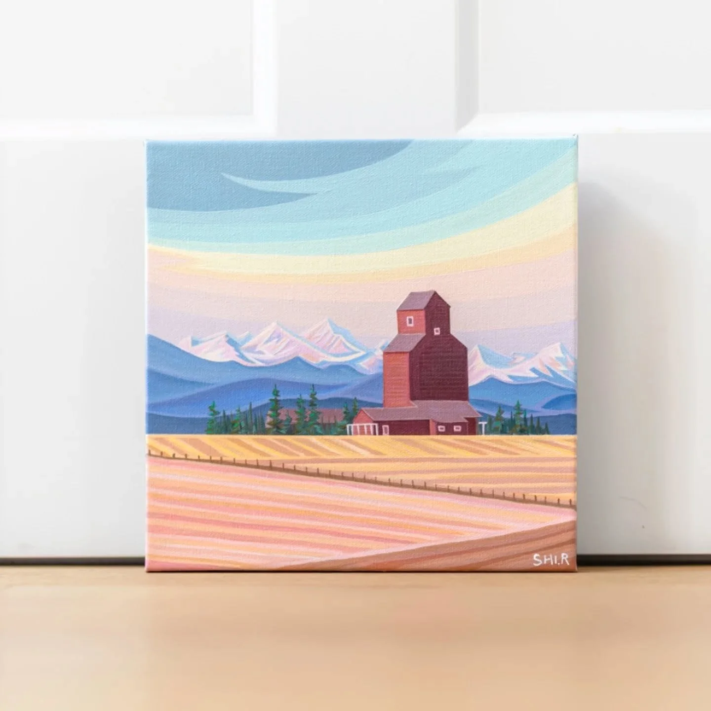 There&rsquo;s something so peaceful about old prairie grain elevators. 

This new 10x10 piece captures the classic Alberta elevator in Azure, now a ghost town just south of Calgary. 

I really loved working with the soft colours in this one. It feels