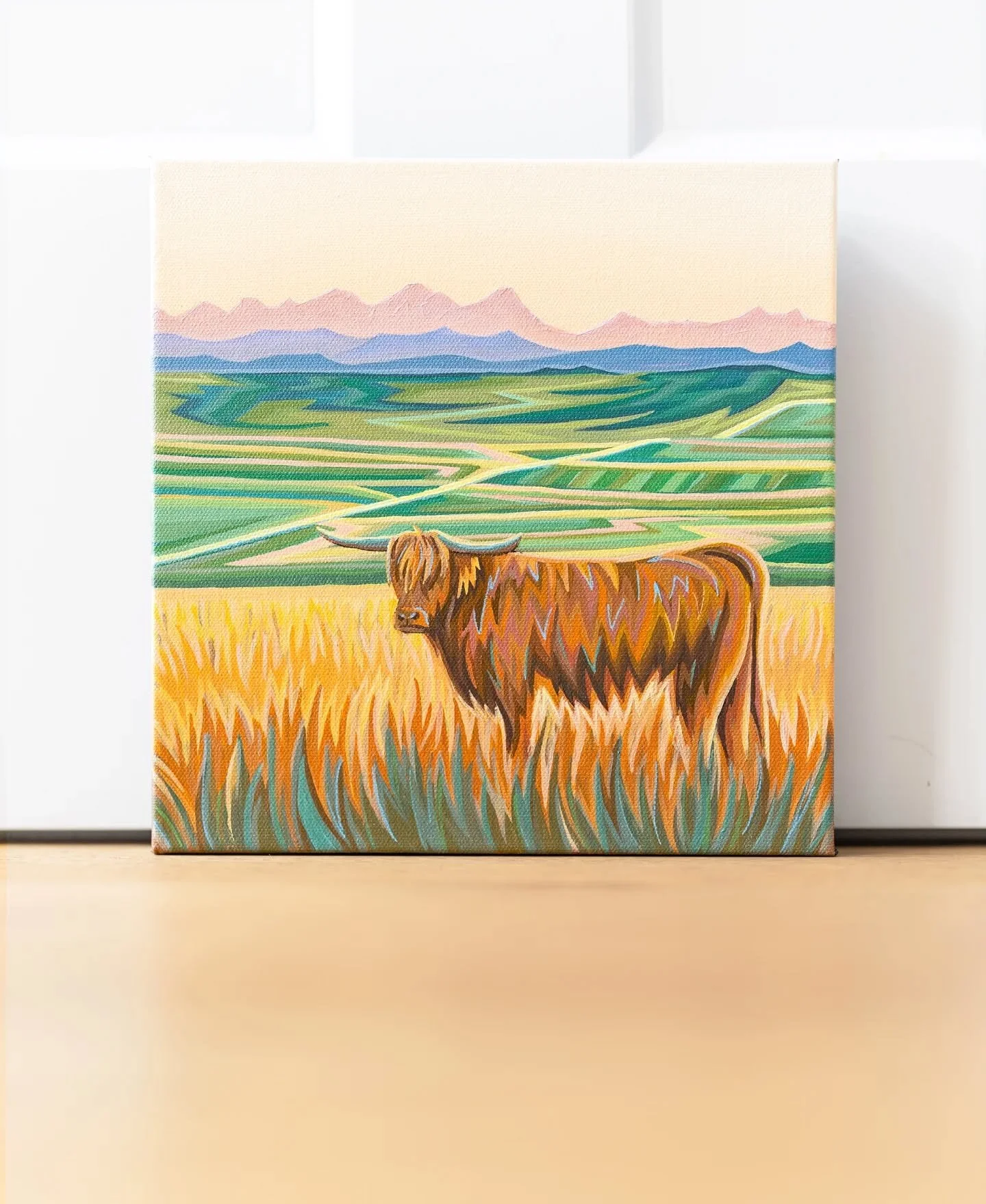 Another new 10x10 piece heading to the Calgary Stampede Miniature Masterpiece show this summer!

An Alberta highland cow glowing in golden hour light. Landscapes have always been my comfort zone, so painting an animal as the main subject for the firs