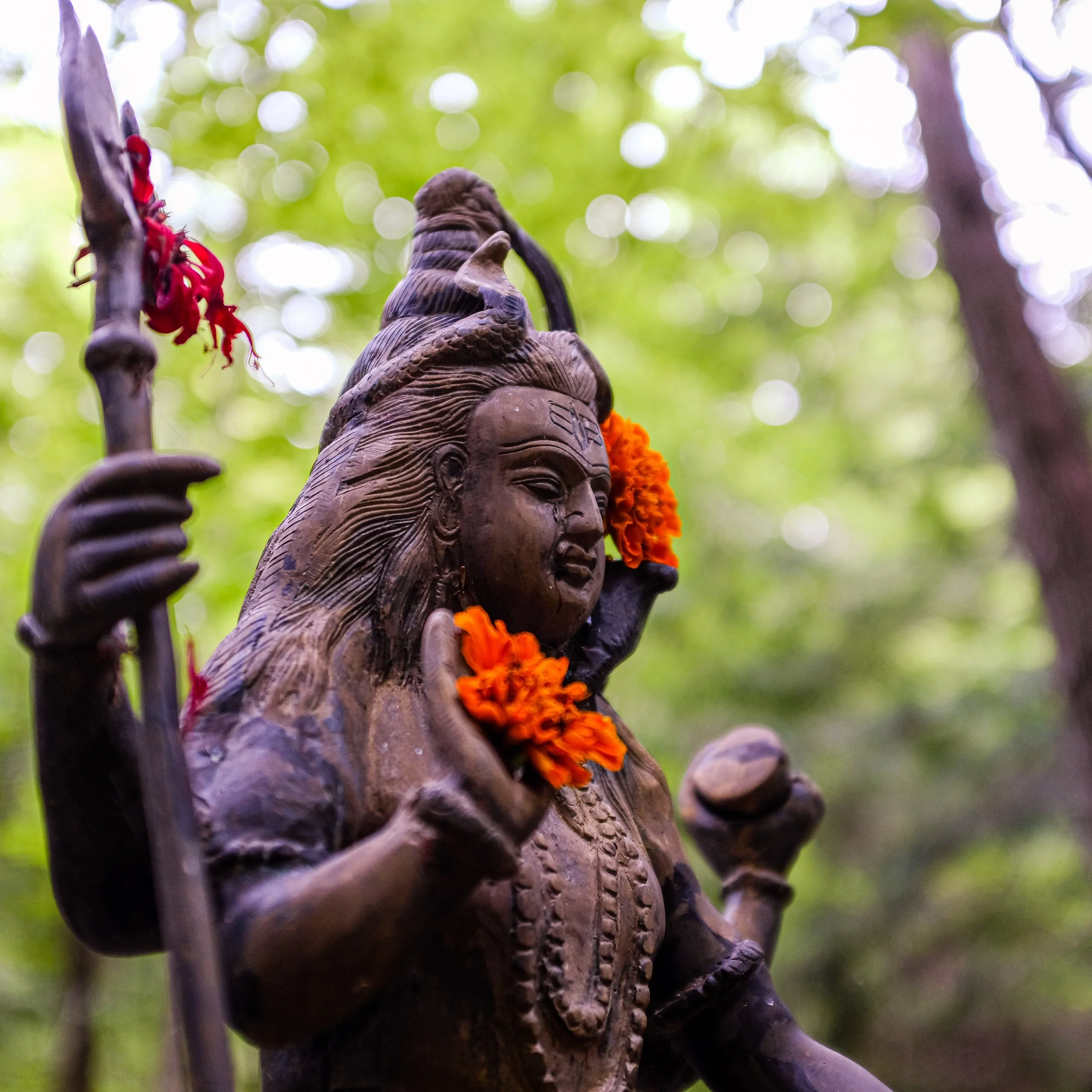 Statue of Shiva adorned with Marigolds