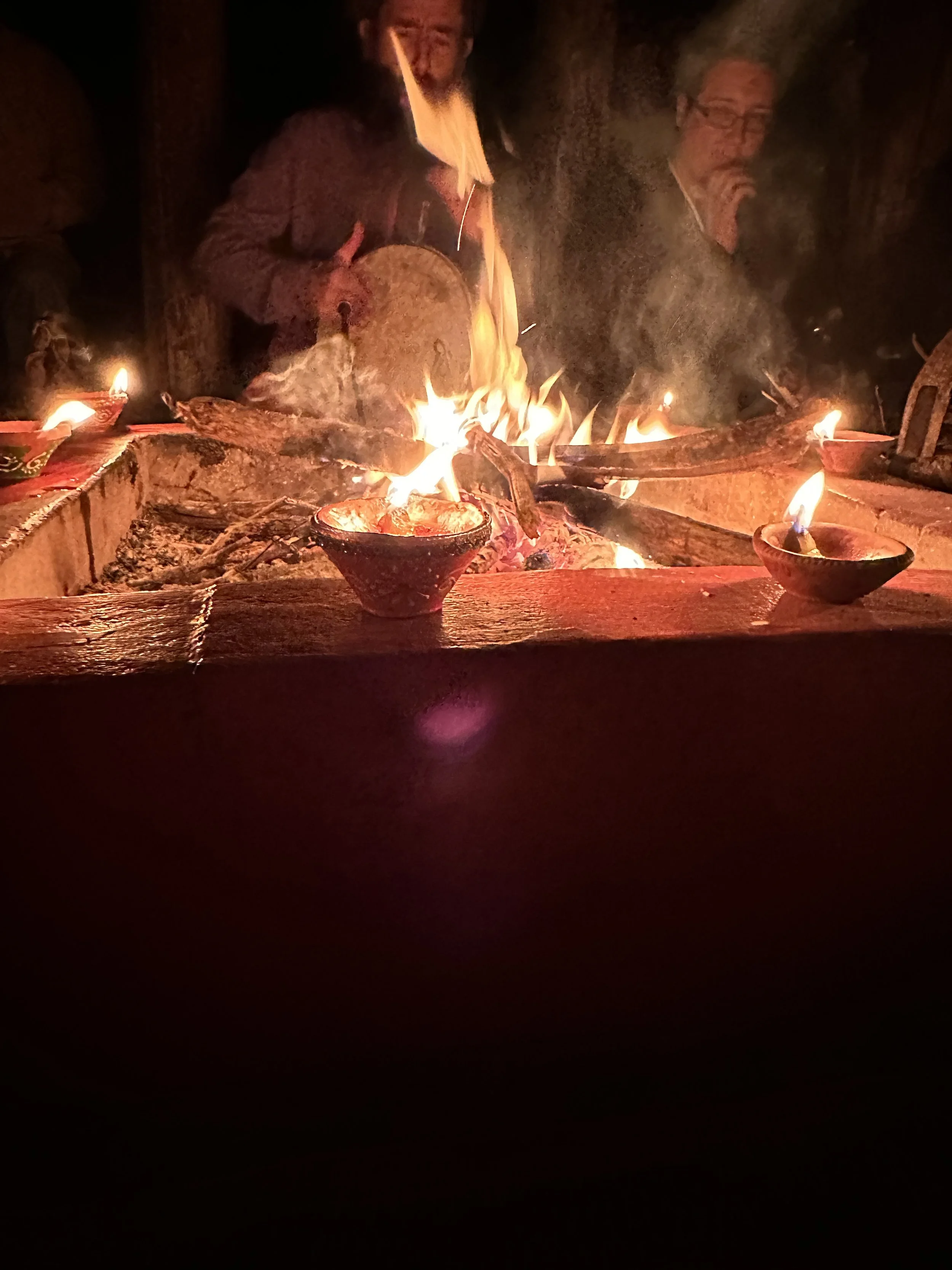 Dhuni fire and Diya lamps