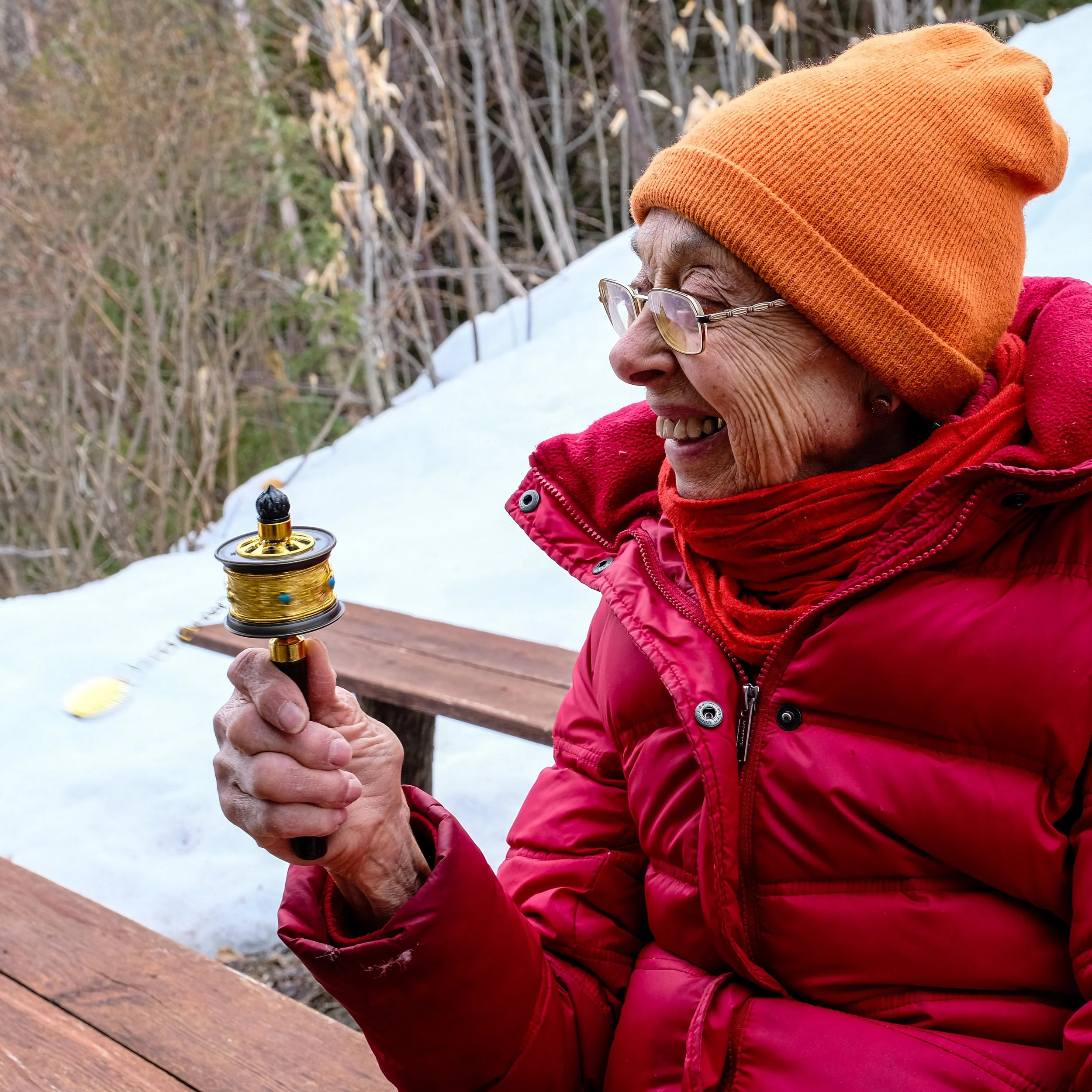 Kula turning her prayer wheel for the benefit of all beings