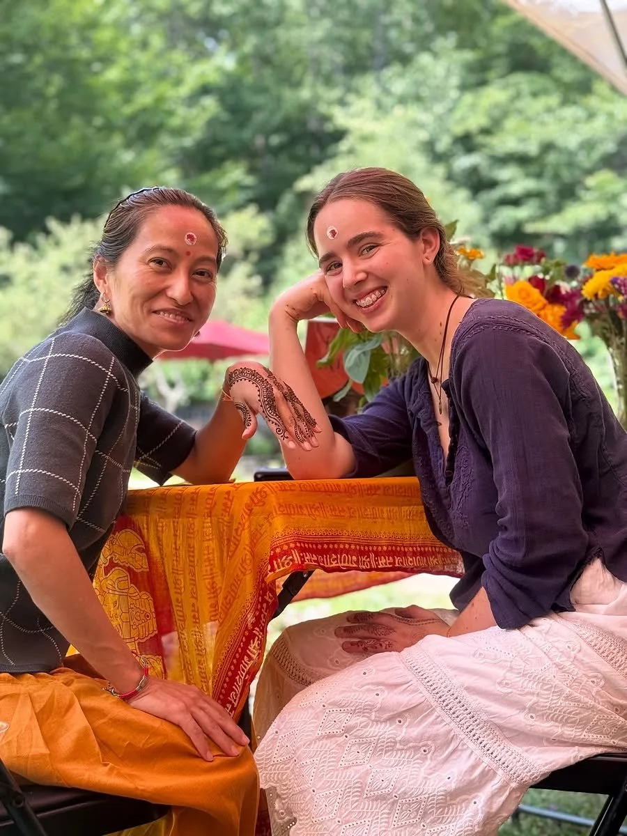Kaya and guest in the Henna tent