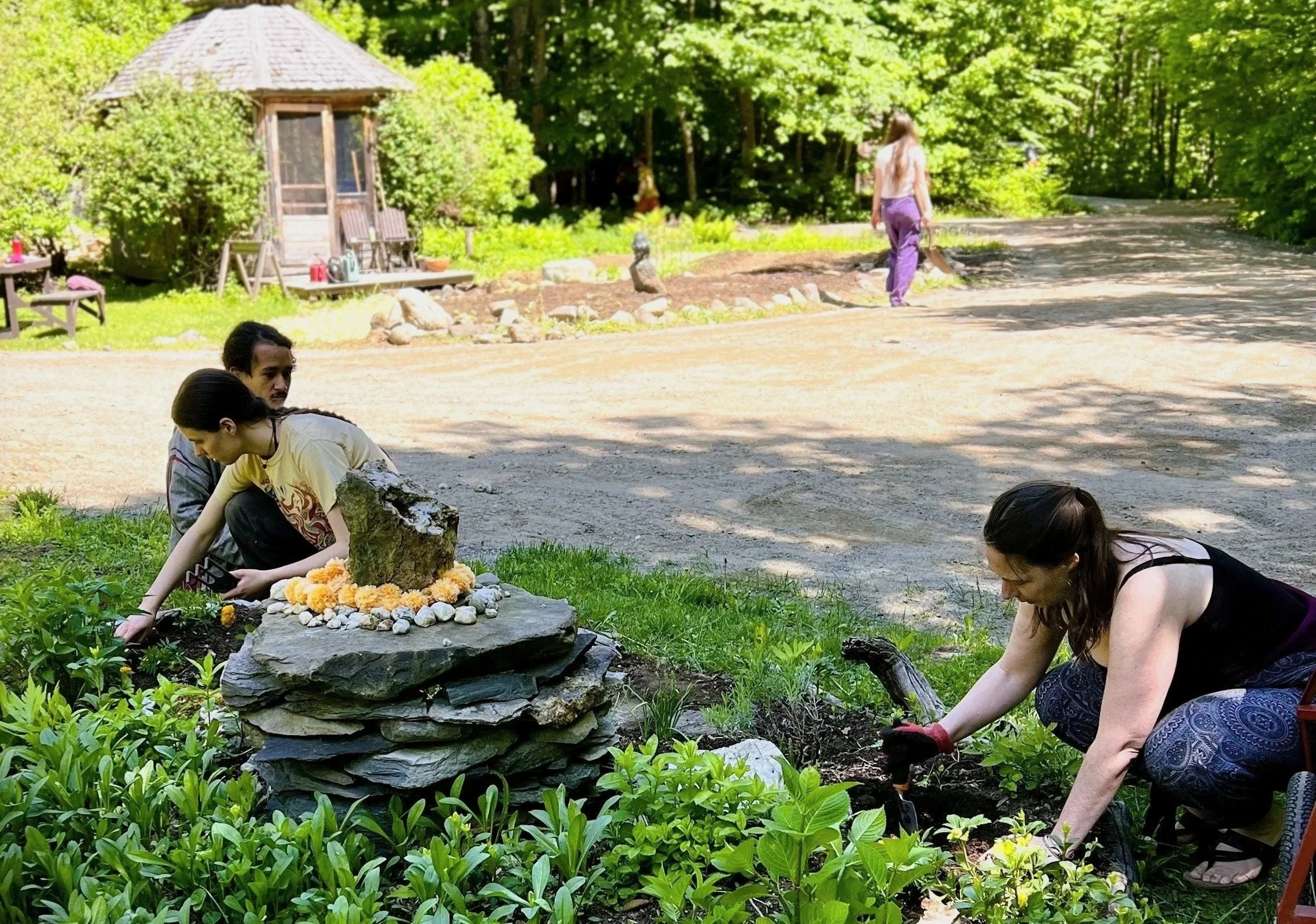 Beautifying the garden at the foot of Siddha Loka