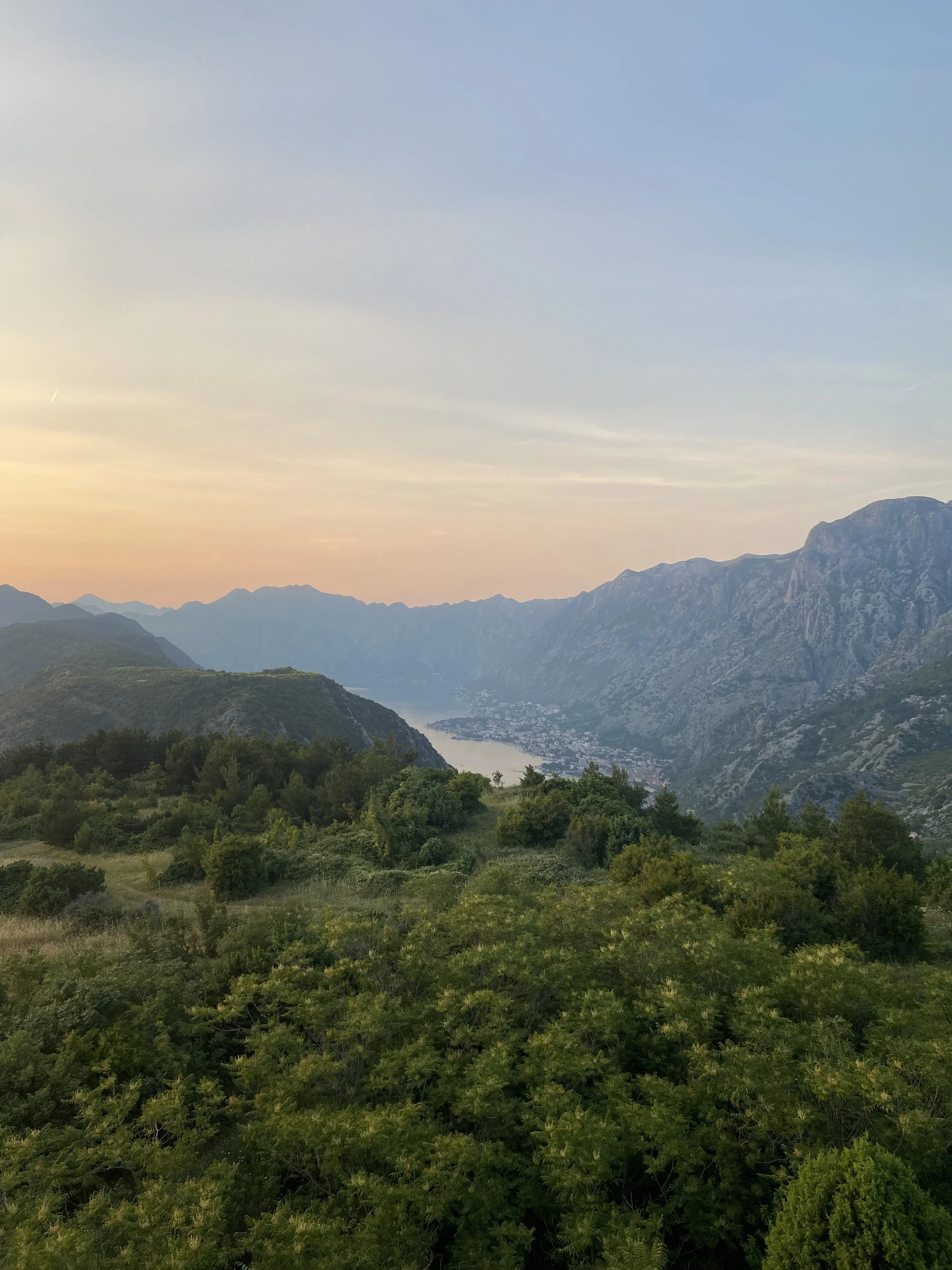 Sunset over the mountains and a small lake.jpg