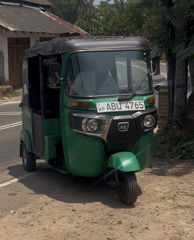 Driving a rented three-wheeler on a self-drive road trip through Sri Lanka
