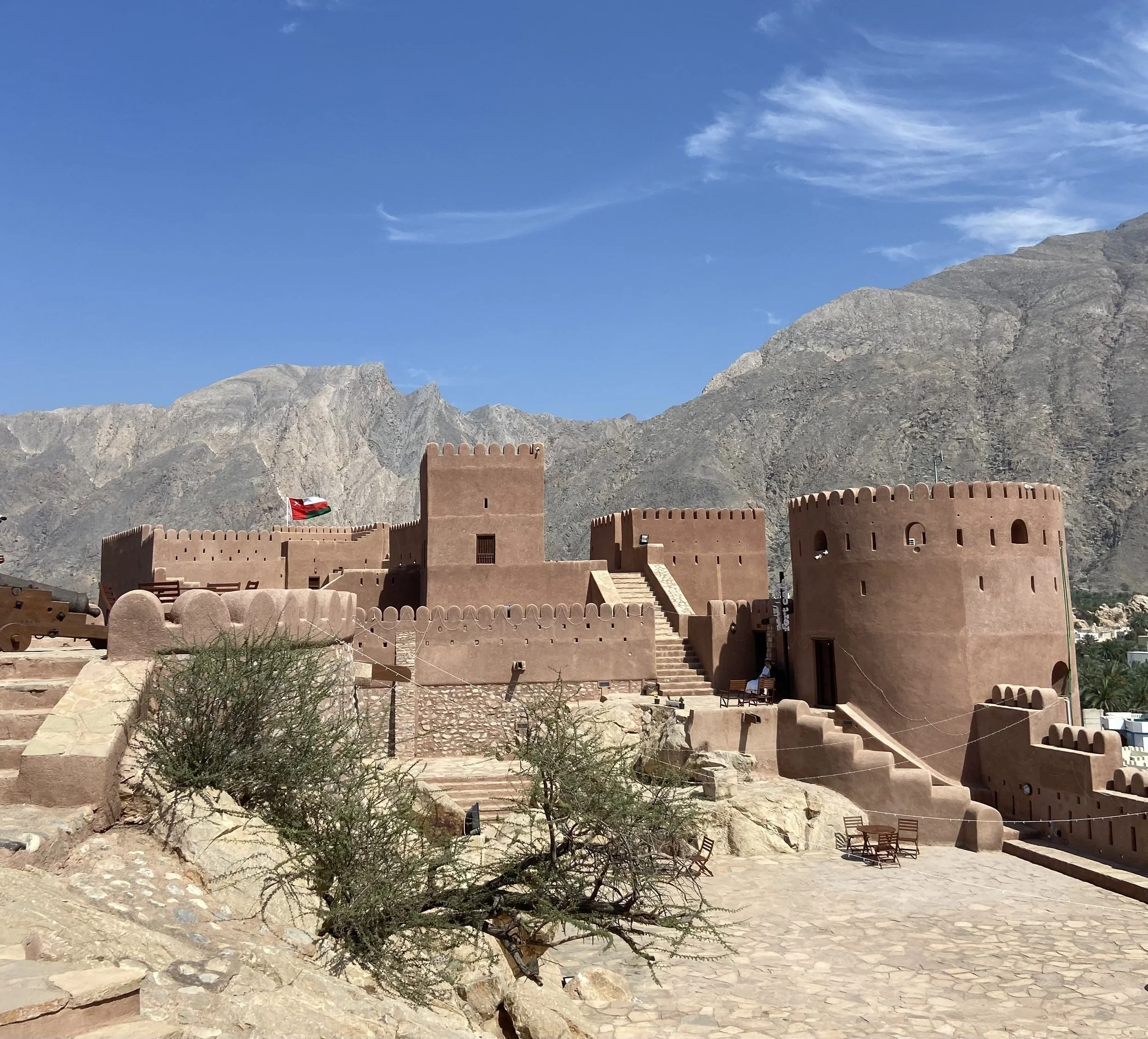 Nakhal fort and the mountains and date palms behind it