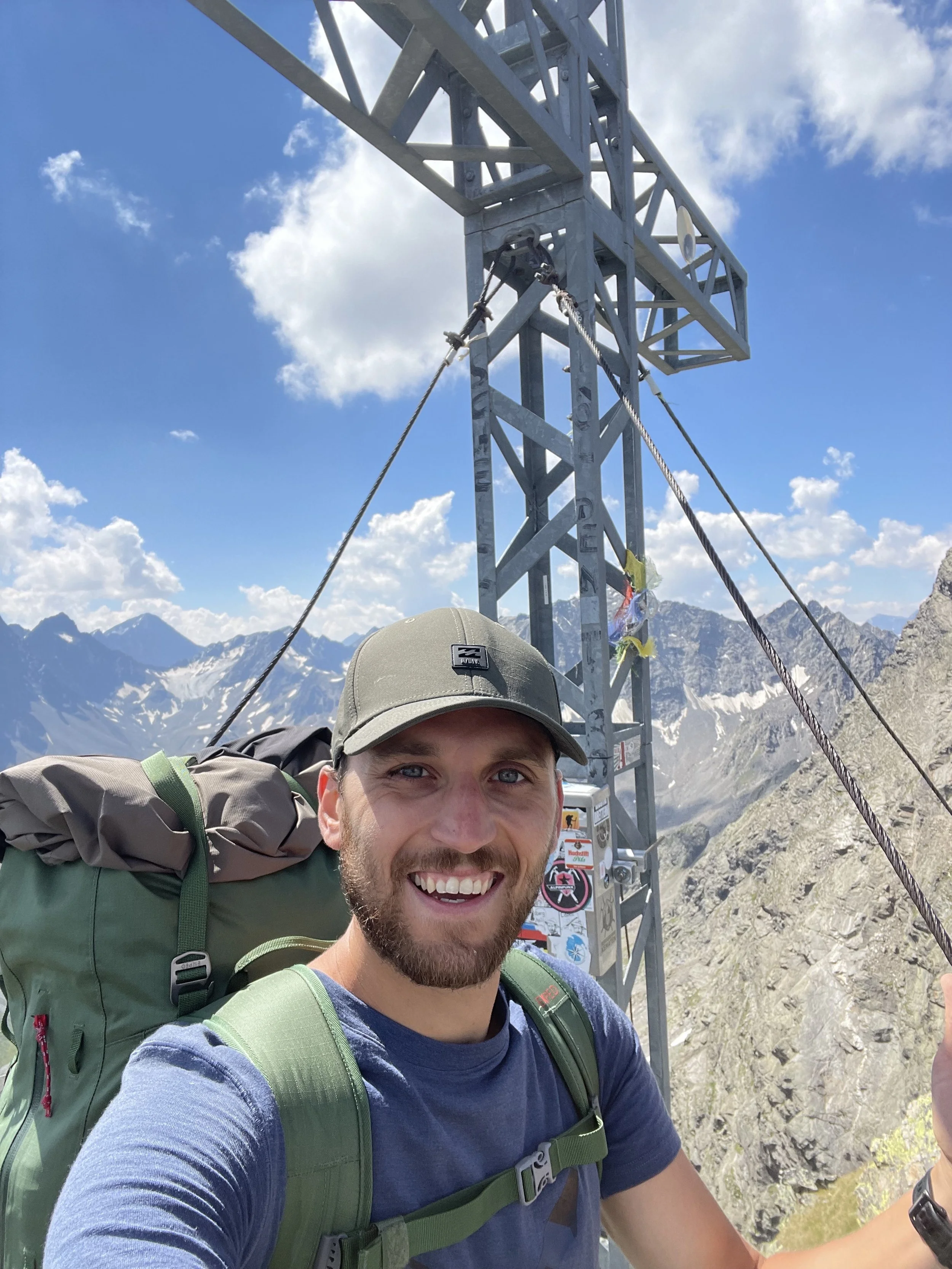 Lukas Wesselich auf einem Berggipfel in Österreich