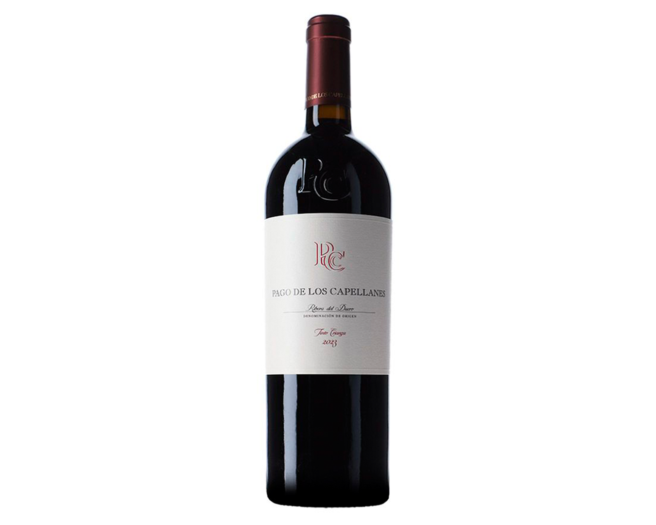 Botella de vino tinto con etiqueta que dice 'Pago de Los Capellanes, Ribera del Duero, 2013'.