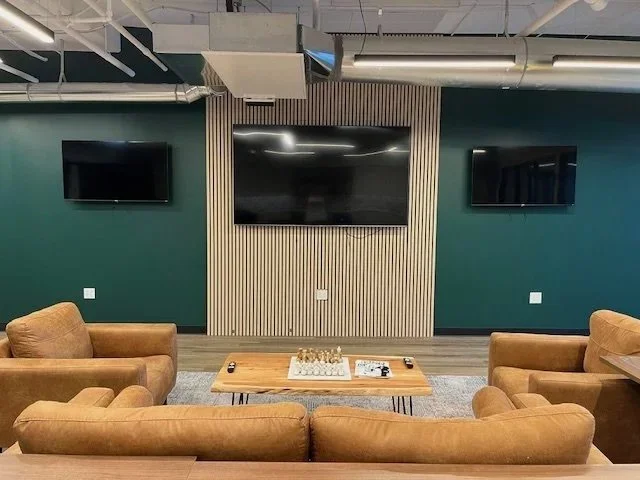Commercial accent wall painting by Van-Go Painting in a coworking lounge space, Denver metro area